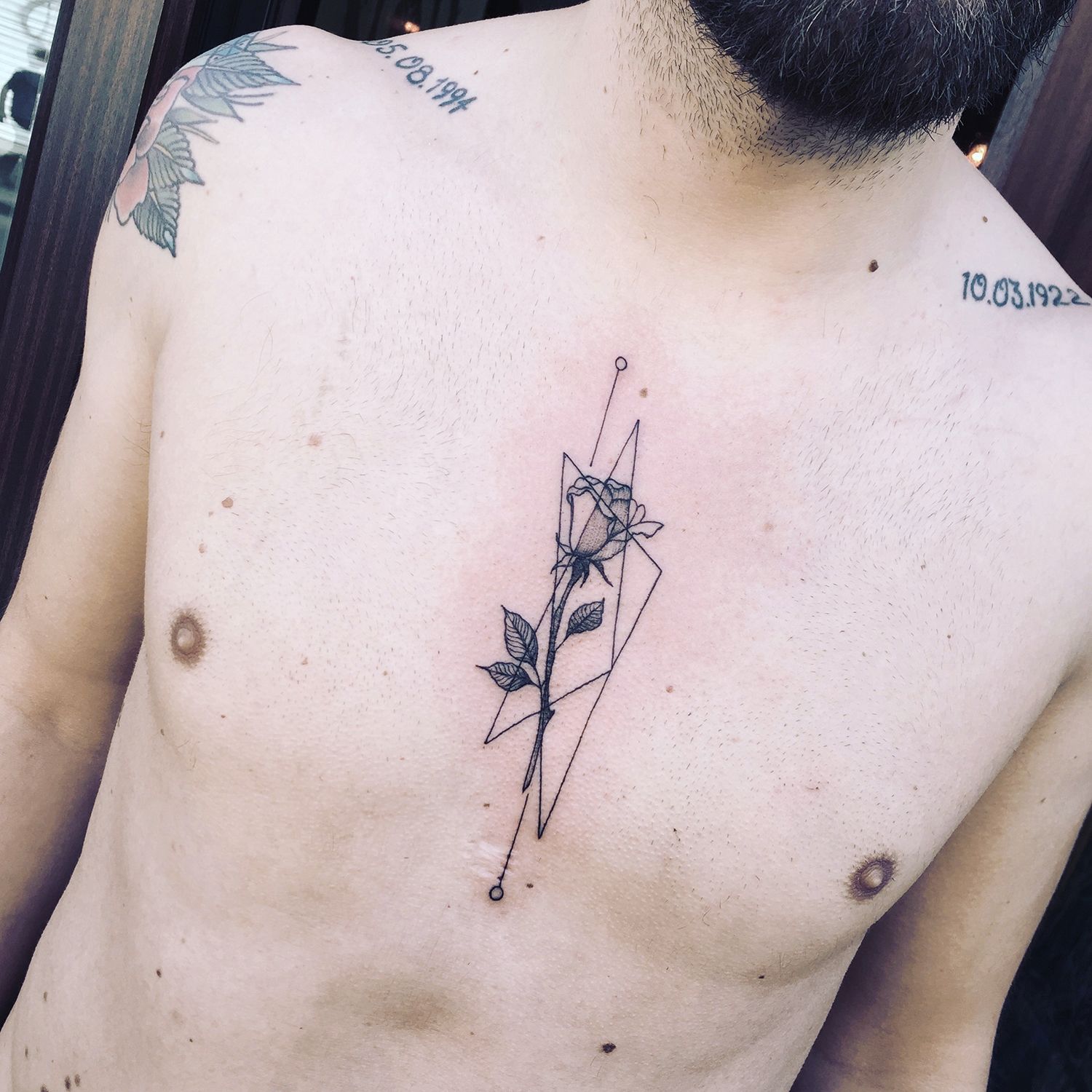 rose tattoo on chest, minimalist