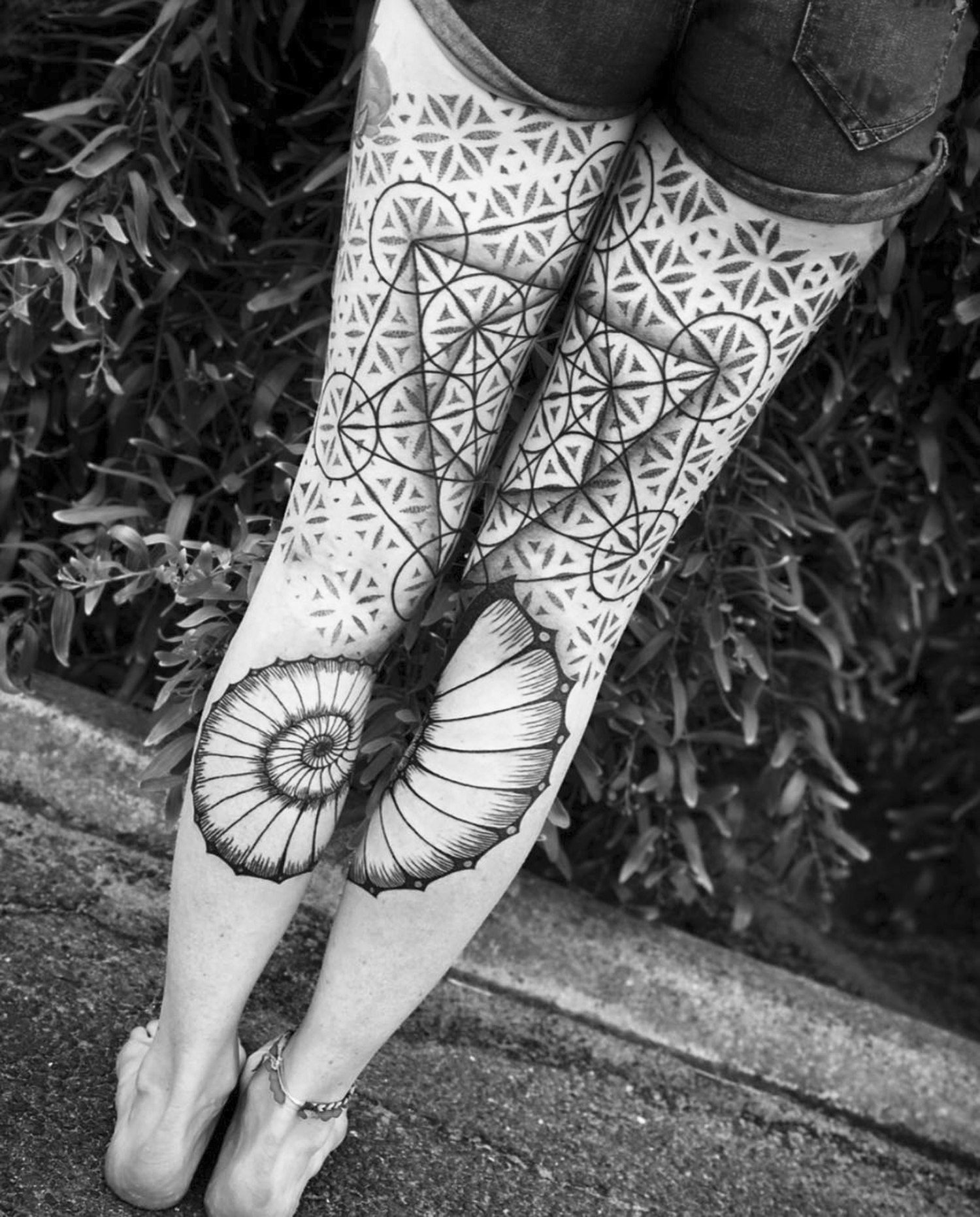 piral leg tattoo, sacred geometry, patterns