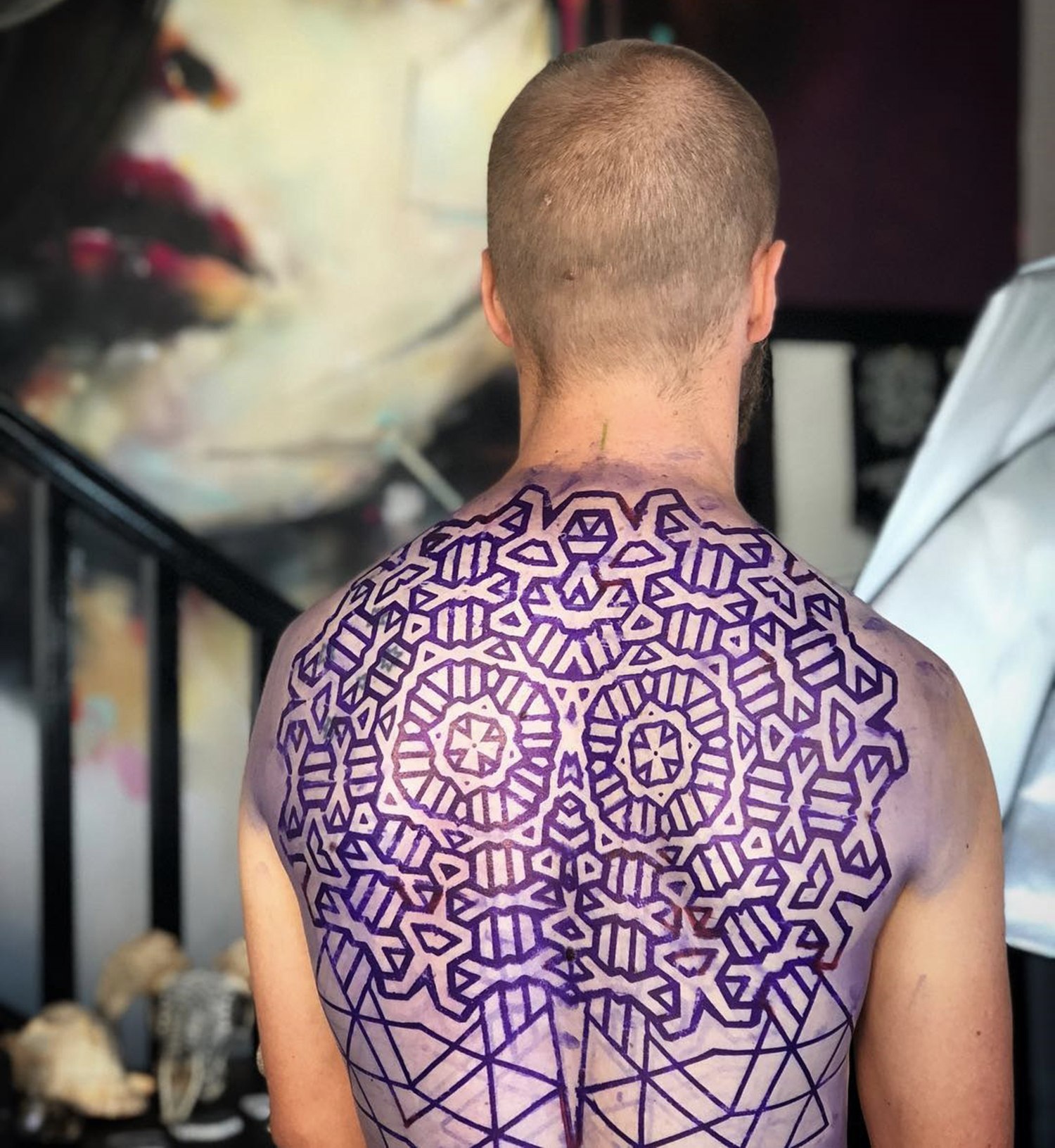 stencil tattoo on back, patterns, geometric shapes