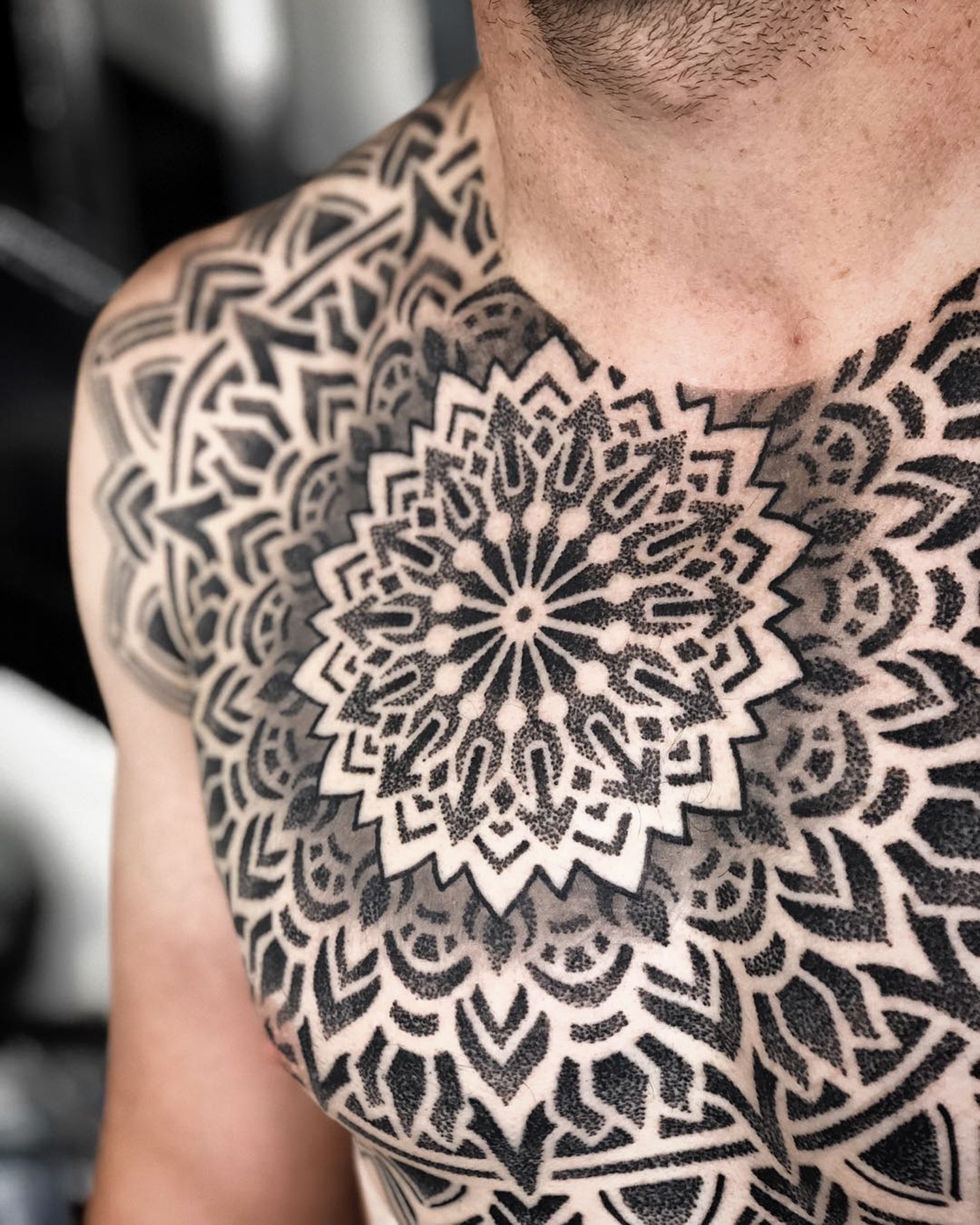 closeup of mandala tattoo, dotwork