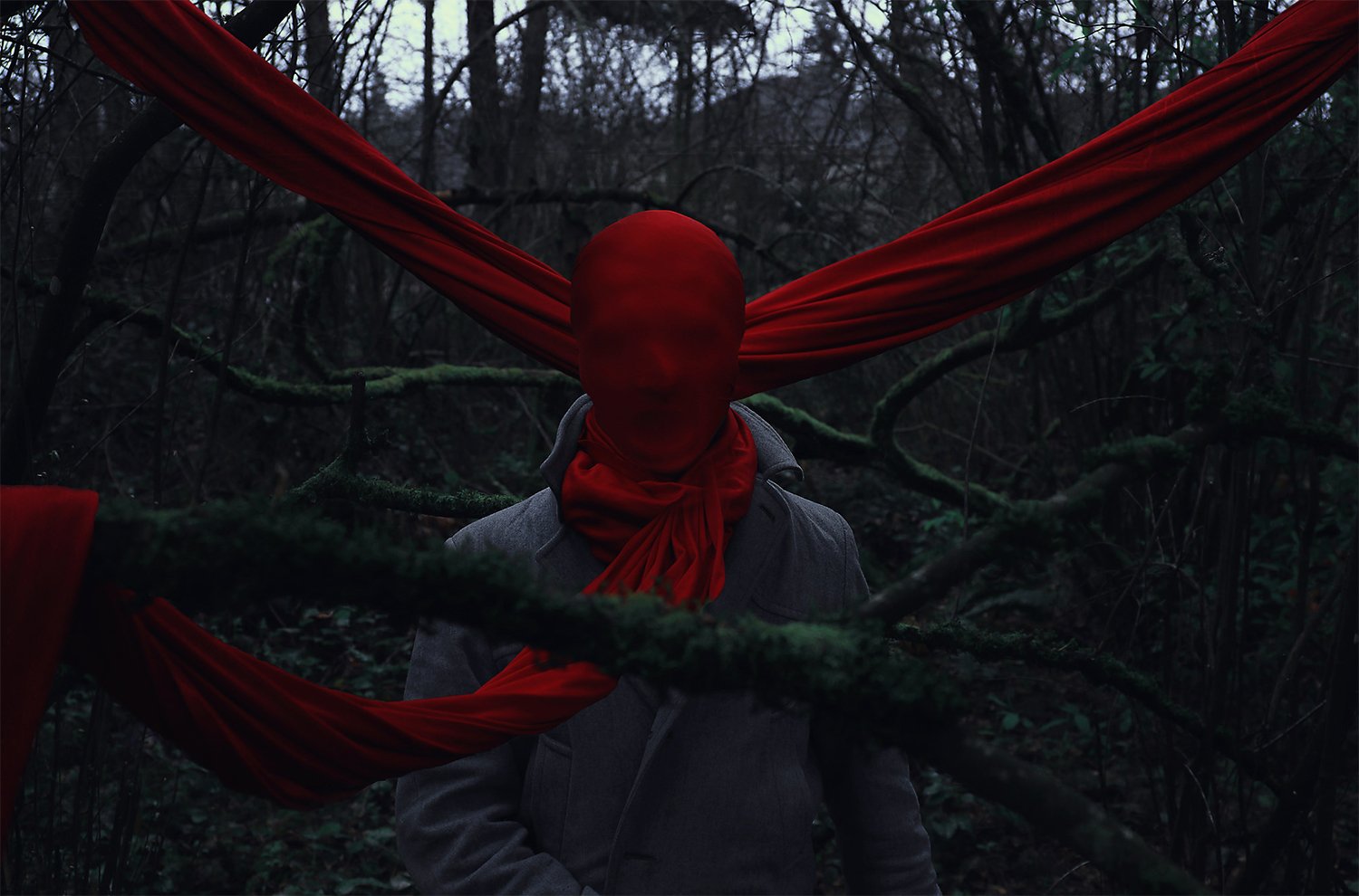 bound and tied in red sheets, dark photography