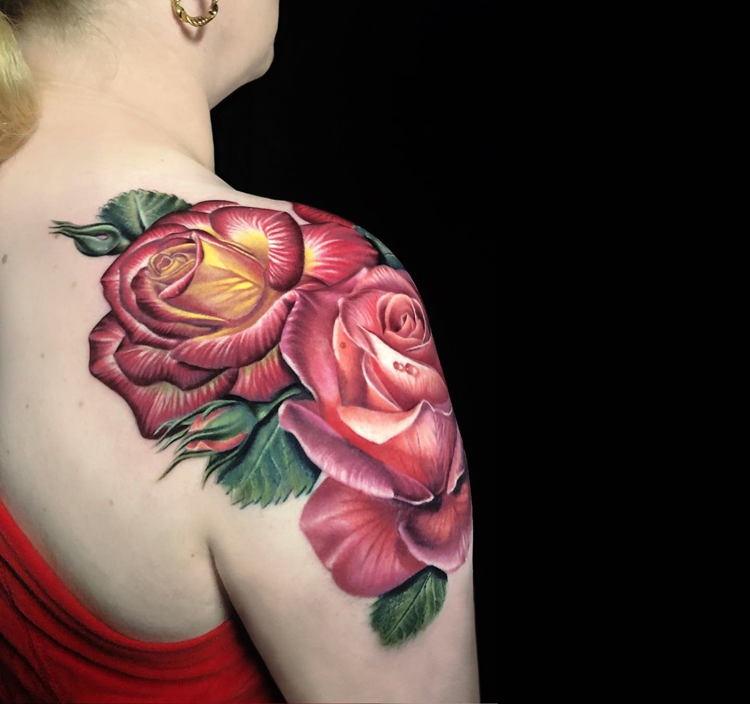 rose tattoo on shoulder by megan massacre