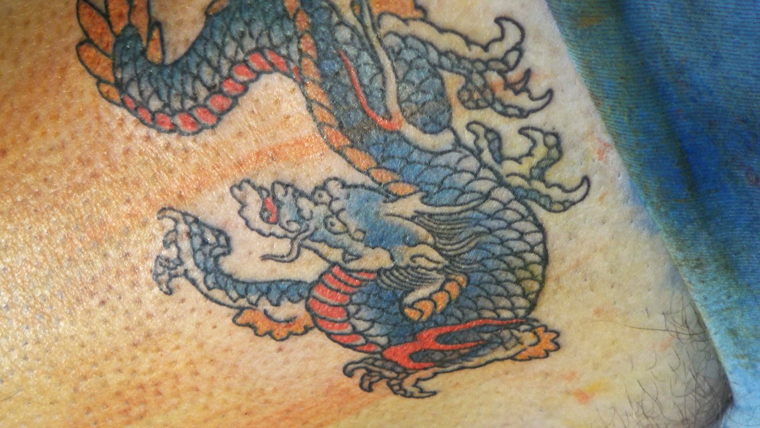 Dragon tattoo by ami james, tattoo convention