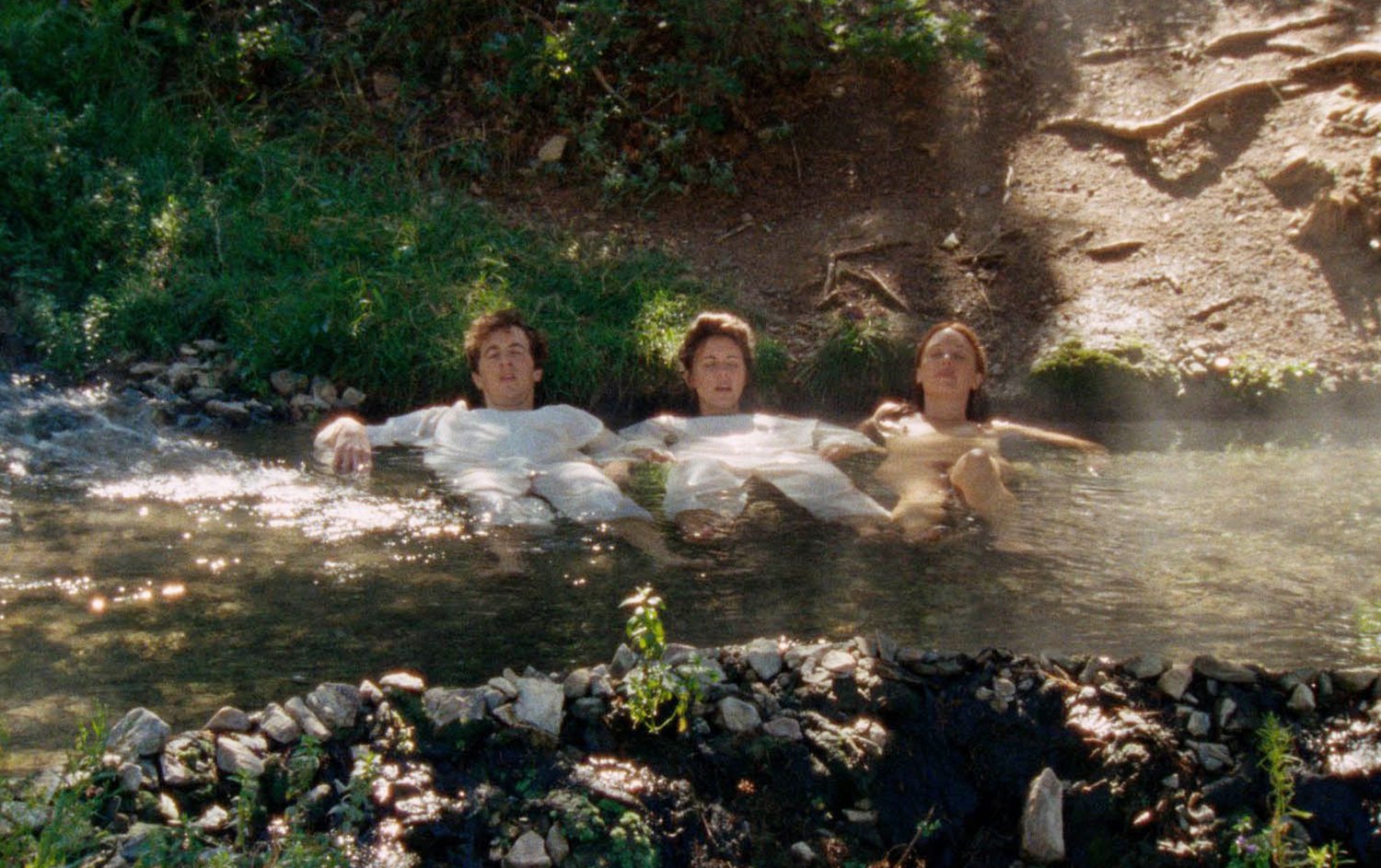 three people laying in water, Two Plains and a Fancy