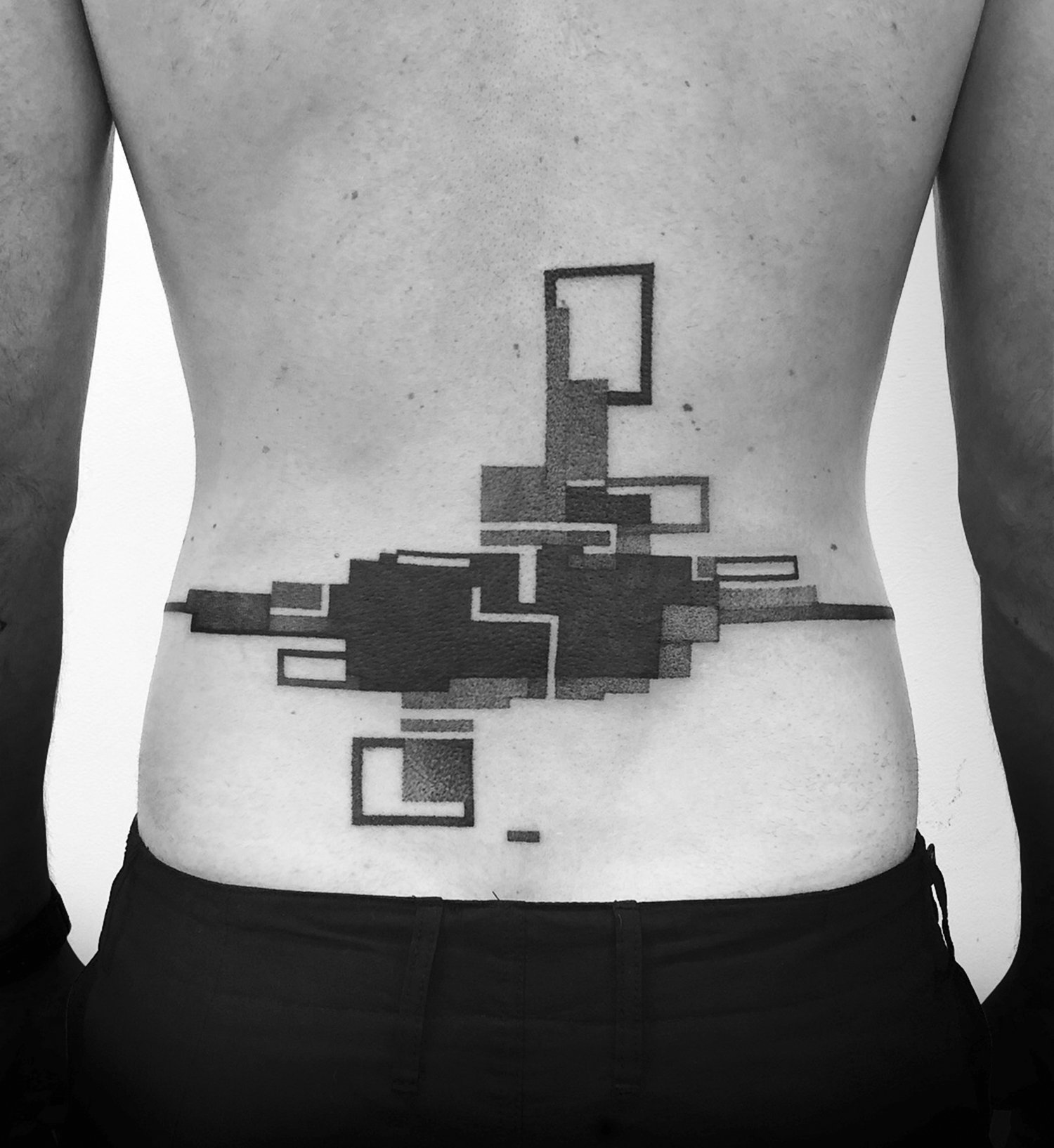 geometric shapes on back, abstract tattoo