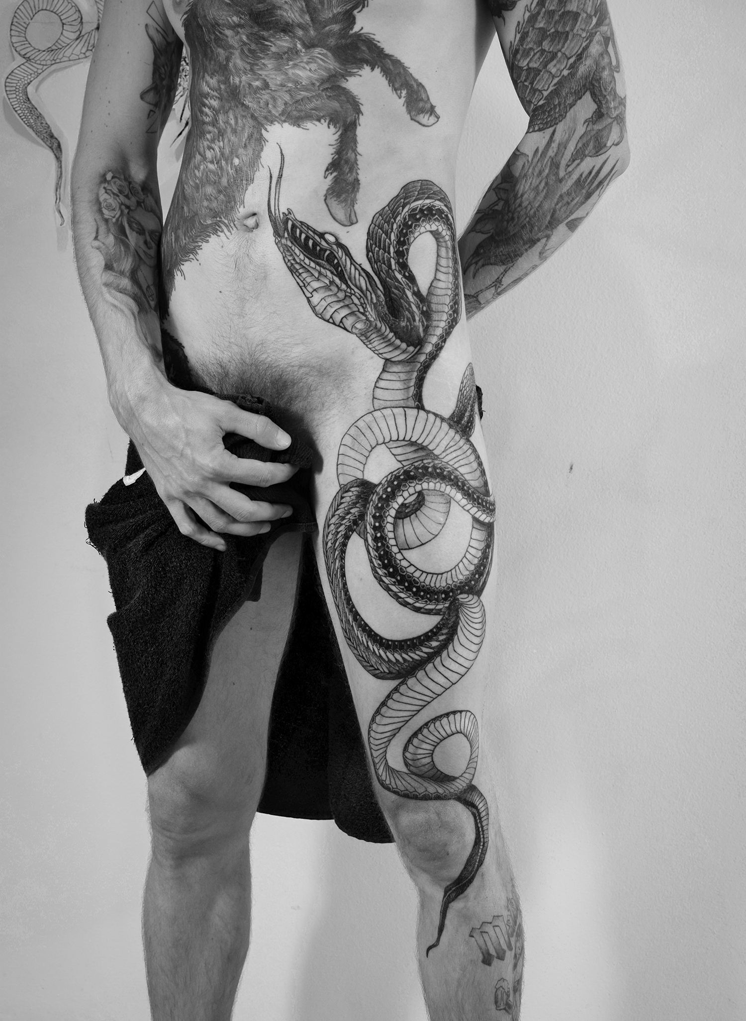 big snake on leg, blackwork tattoo