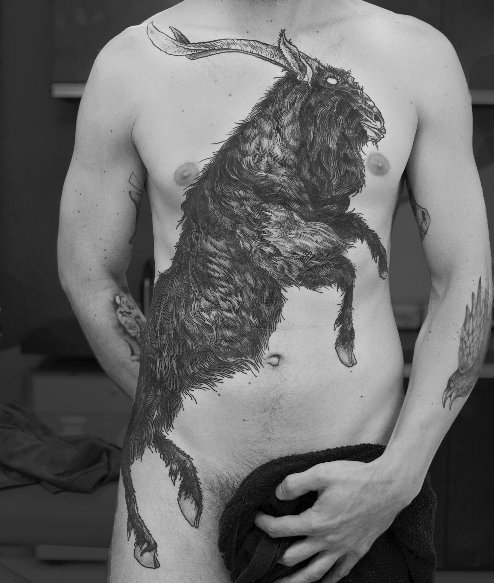 epic animal tattoo on chest, blackwork