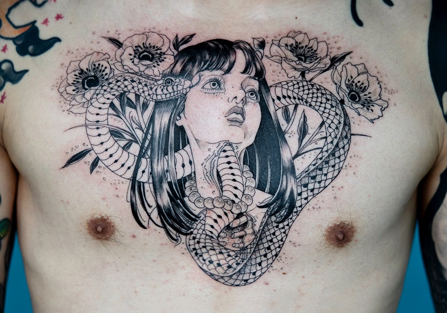 girl and snake, amazing tattoo by oozy, best artist of the year