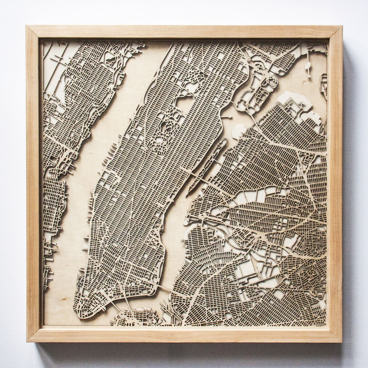 Hubert Roguski’s “CityWood” uses plywood and laser technology to recreate Manhattan’s cityscape.