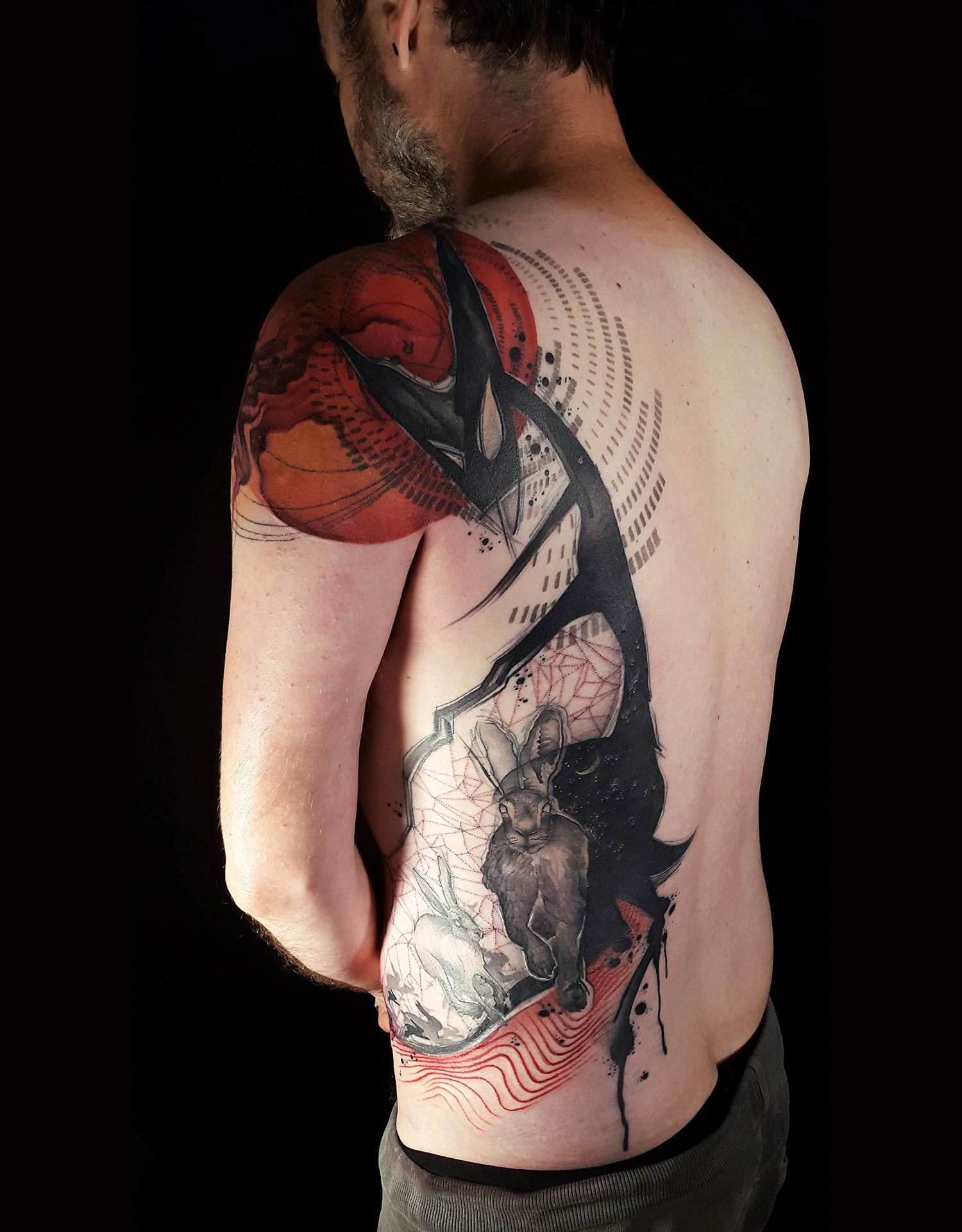 back and shoulder tattoo, red and black ink, tattoo 