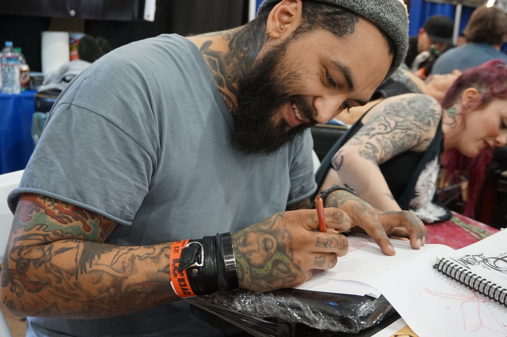 tattooer Ulises-Solis at the feather falls tattoo expo