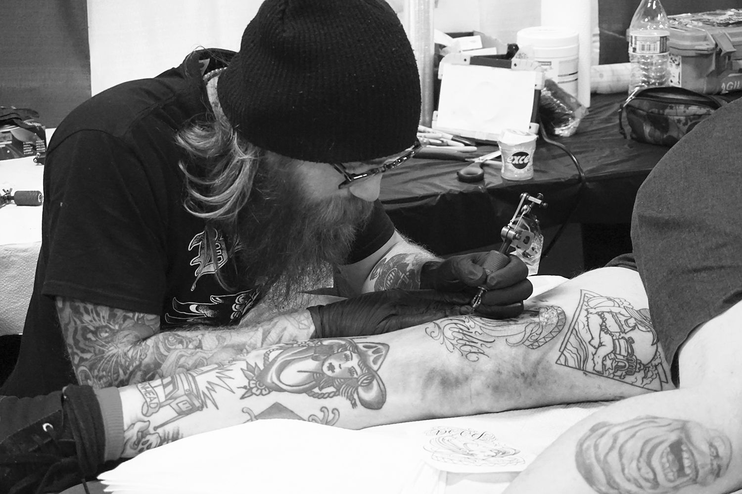 Gipsytiger scripting tattoo on leg, blackwork, tattoo coverage