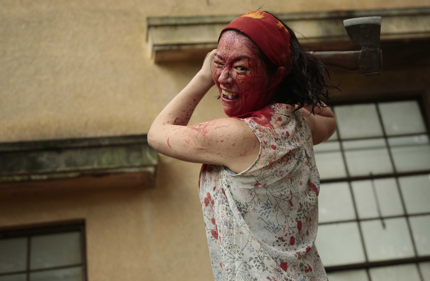 bloody faced woman, one cut of the dead