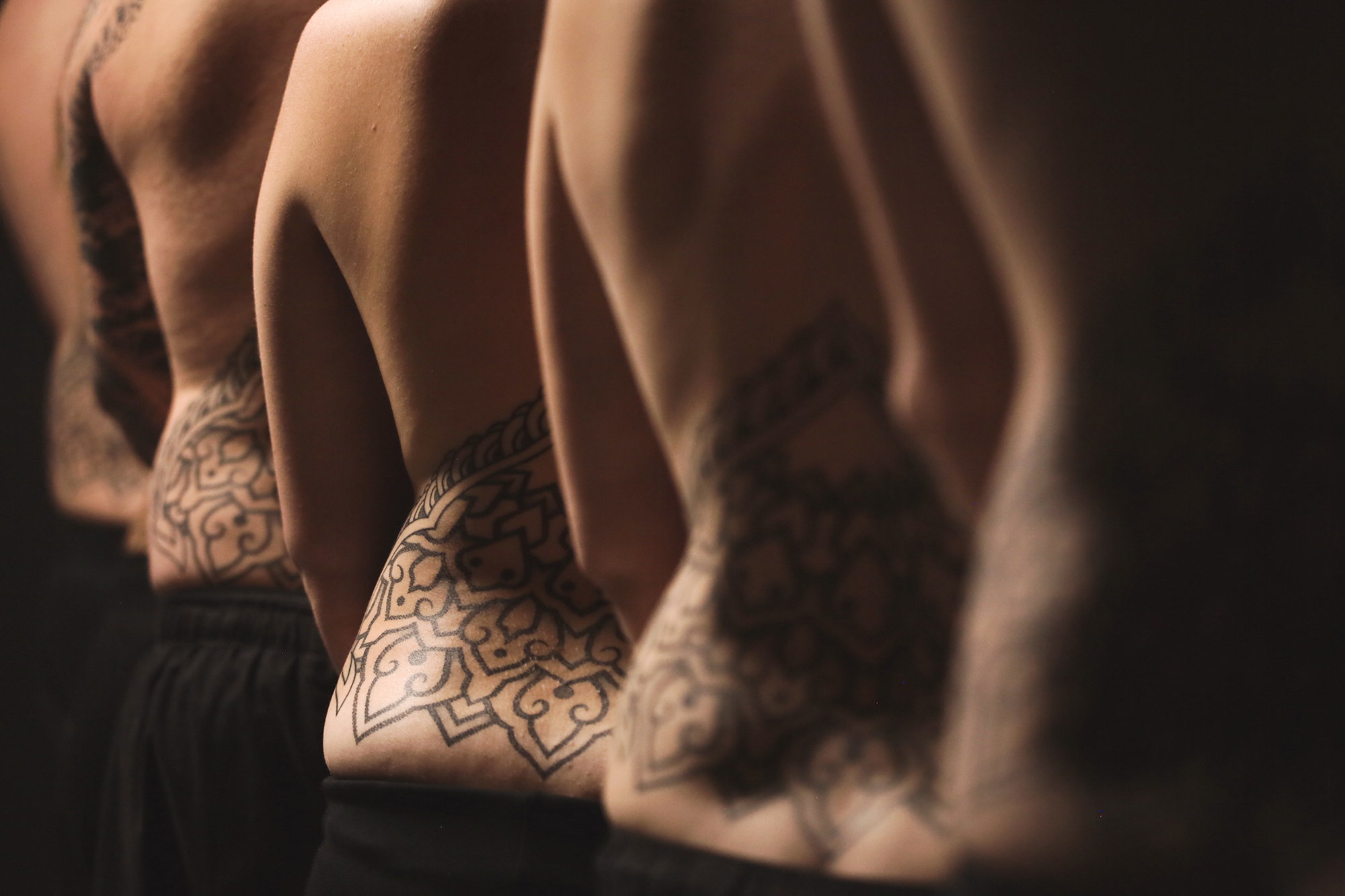 close up of the Unified Back Project, 6 bodies tattooed