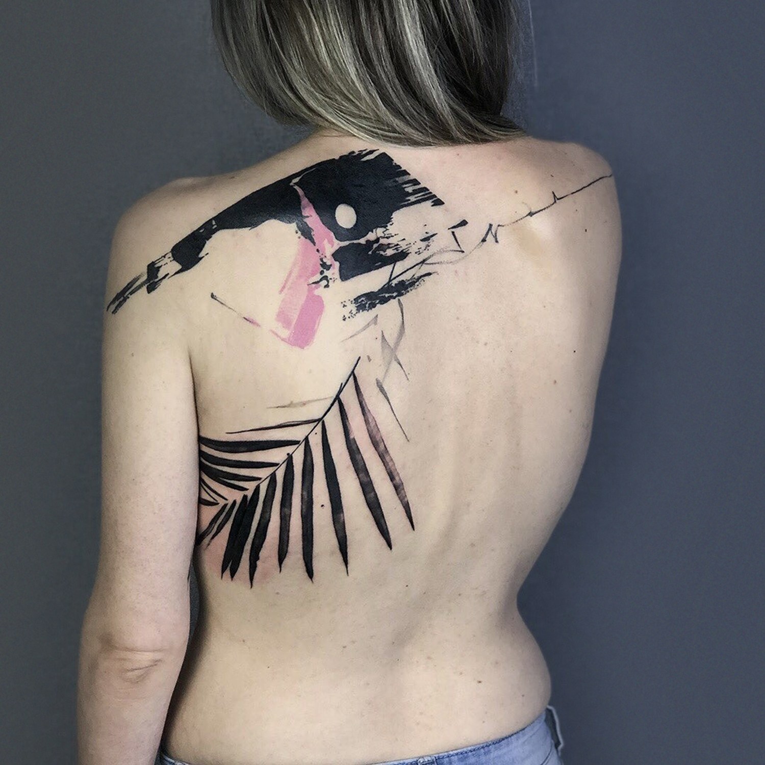 abstract cover up tattoo on back