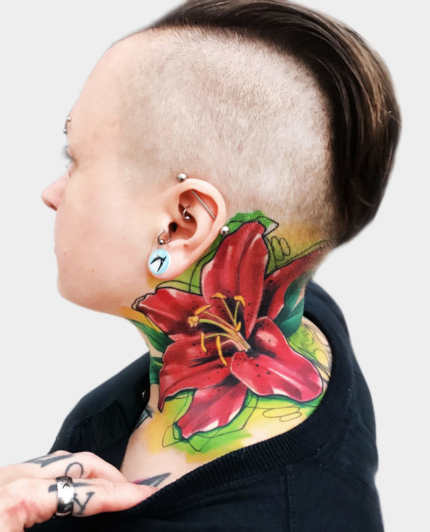 flower on neck, tattoo by ivana