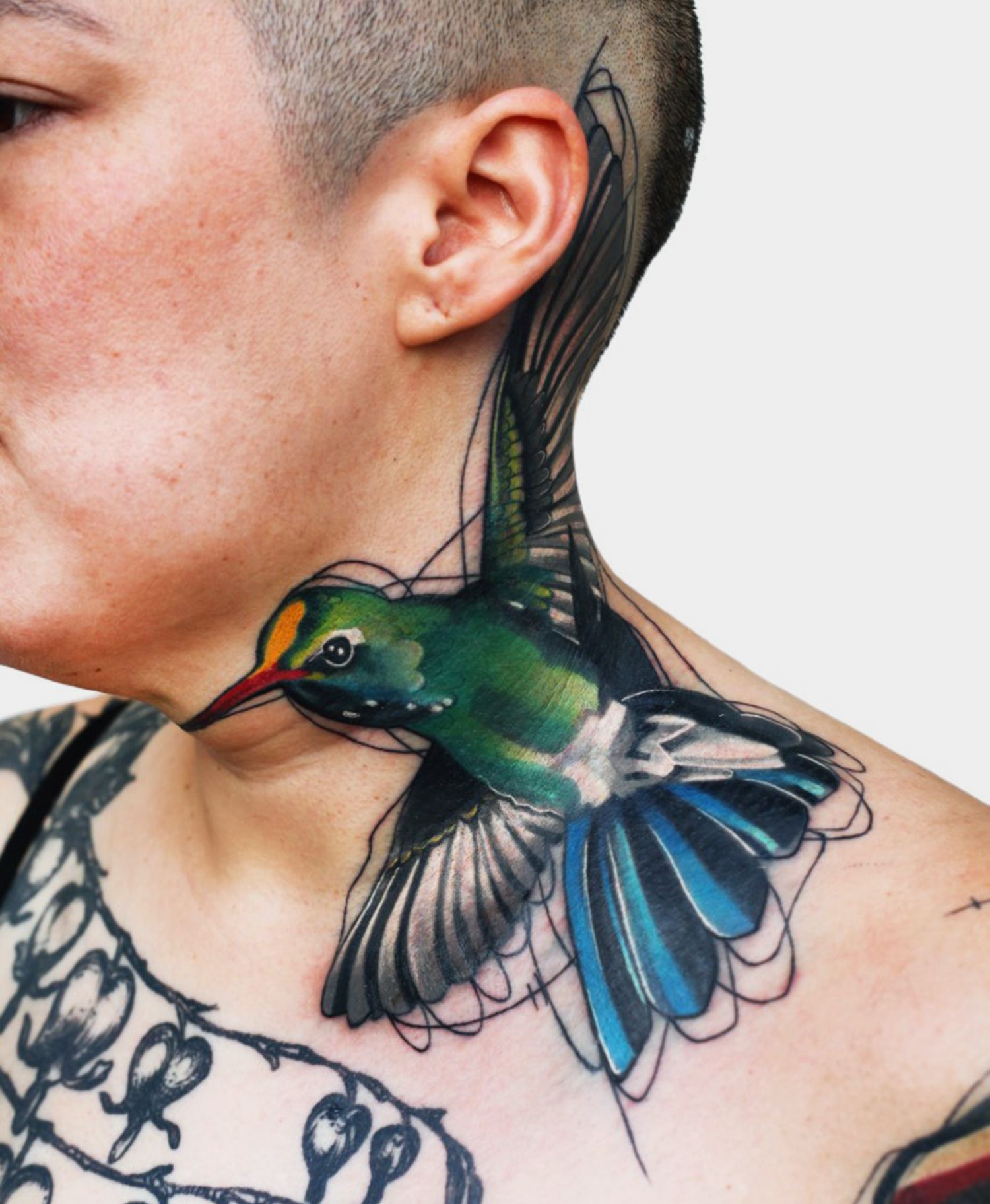 hummingbird tattoo on neck