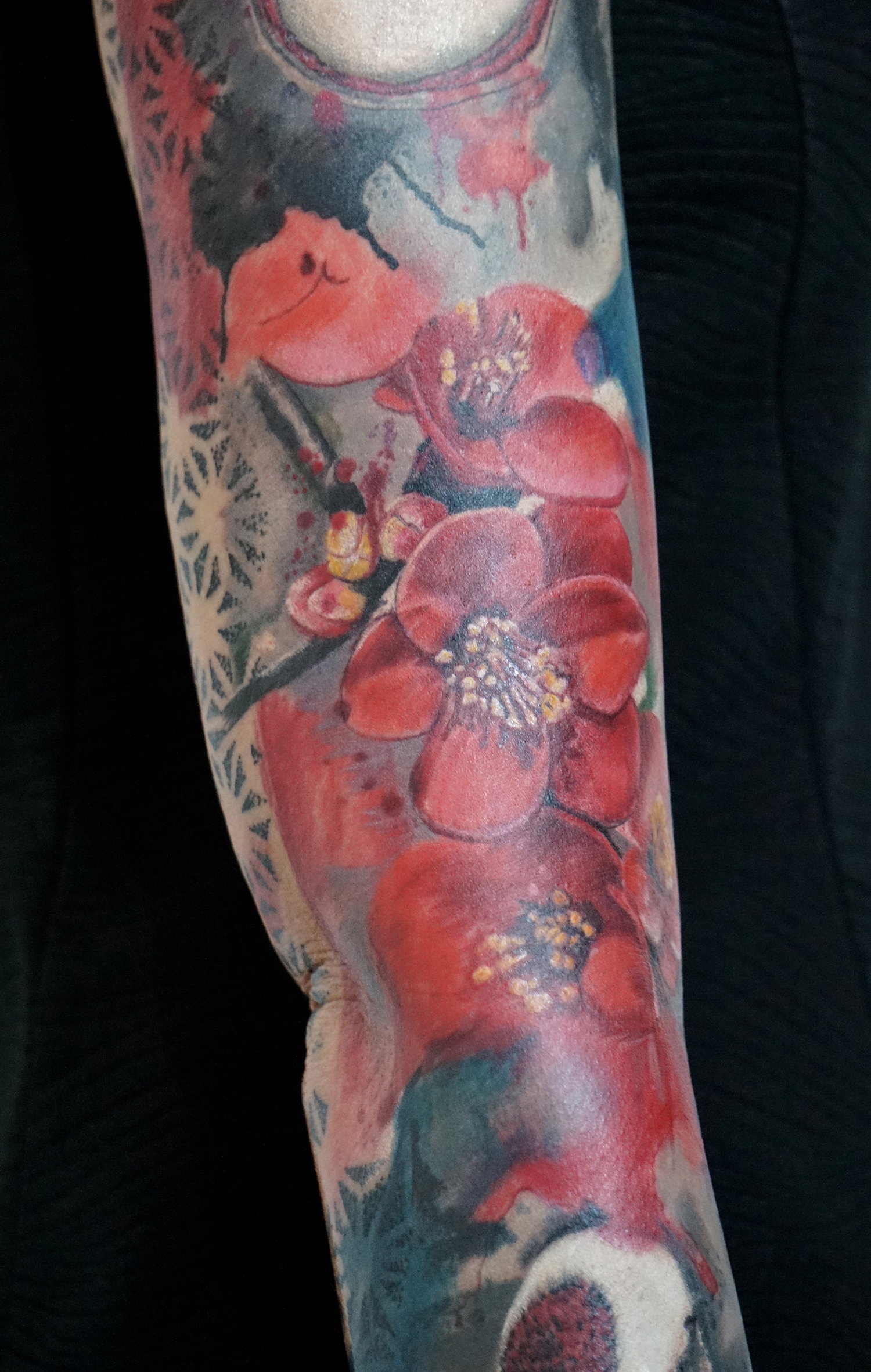 A glimpse at the elaborate Asian-style tattoo by Andy Kemp.