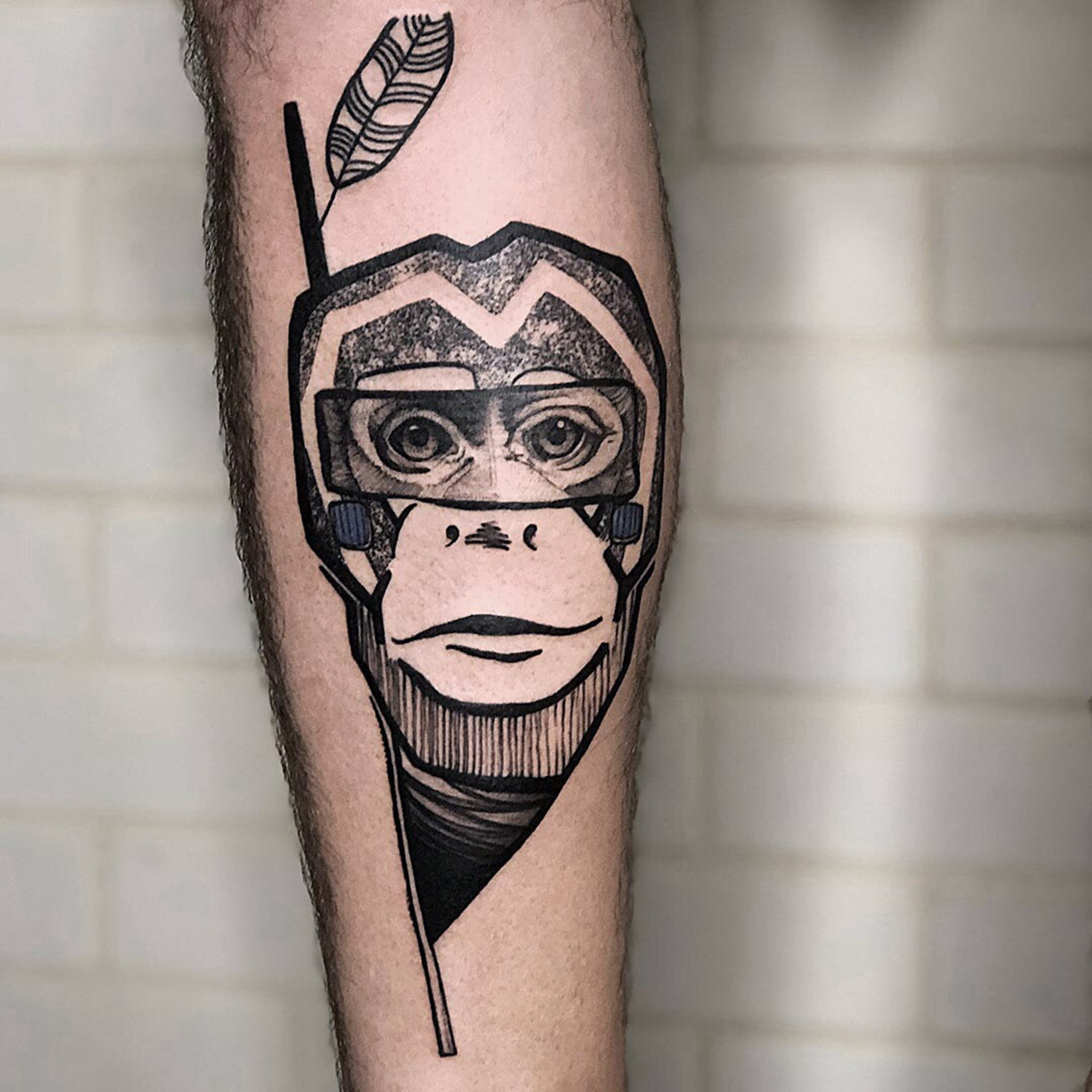 monkey tattoo on leg by shiran, tel aviv