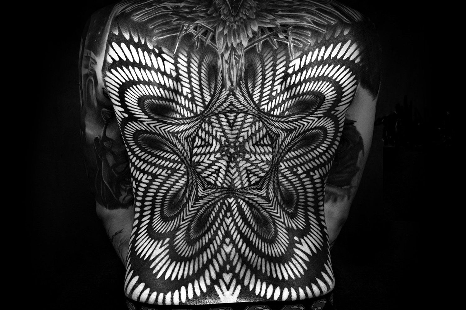 optical illusion back tattoo, blackwork, ornamental body art