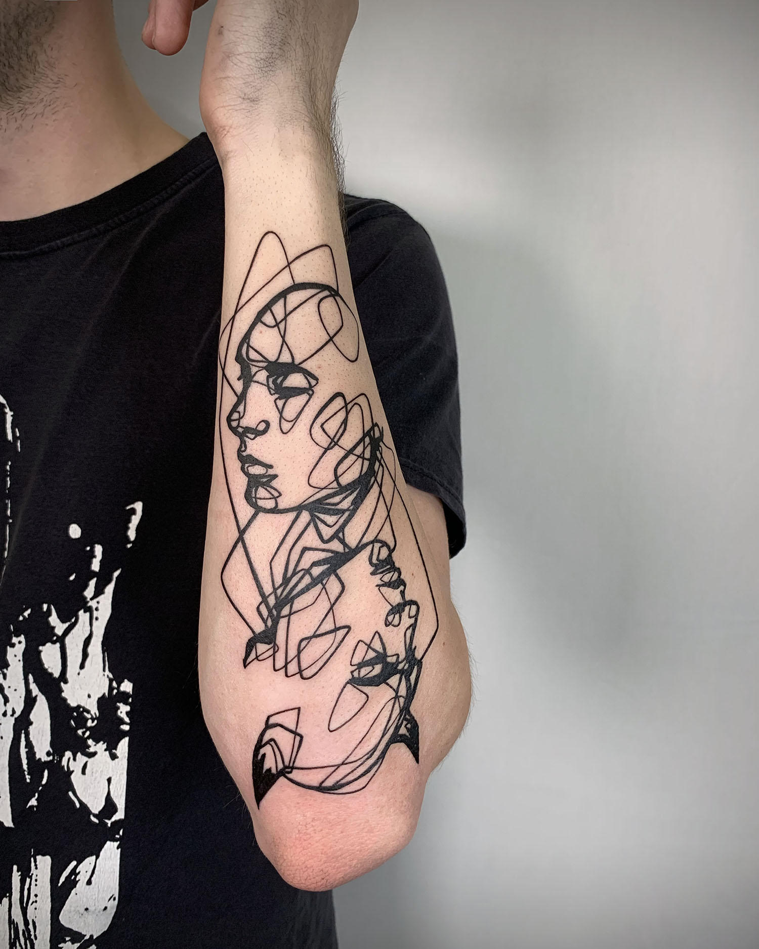 good and evil, sketch tatoo, linework on arm, by jiomaia
