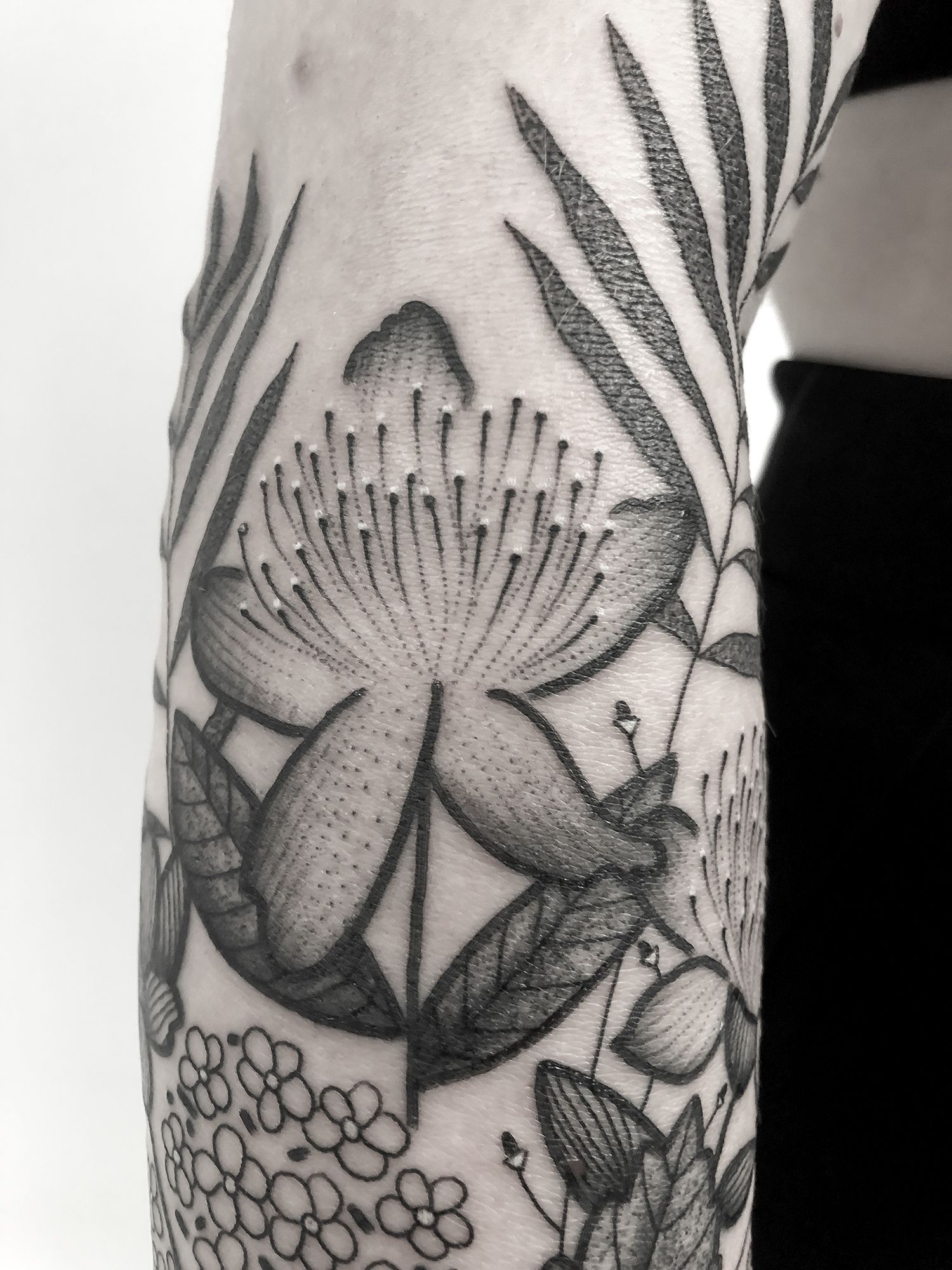 close up of tattoo, black and white ink, tattoo, flower