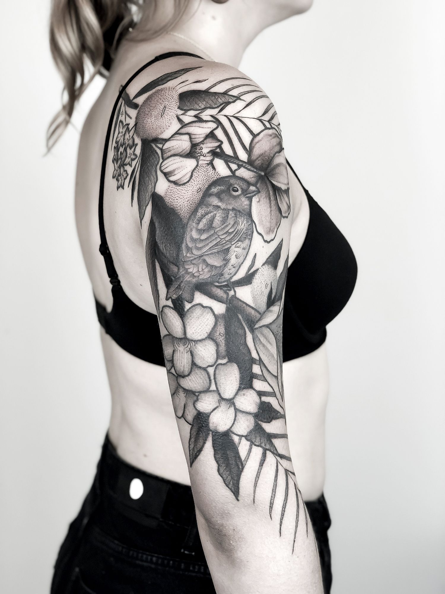 bird and flower tattoo sleeve