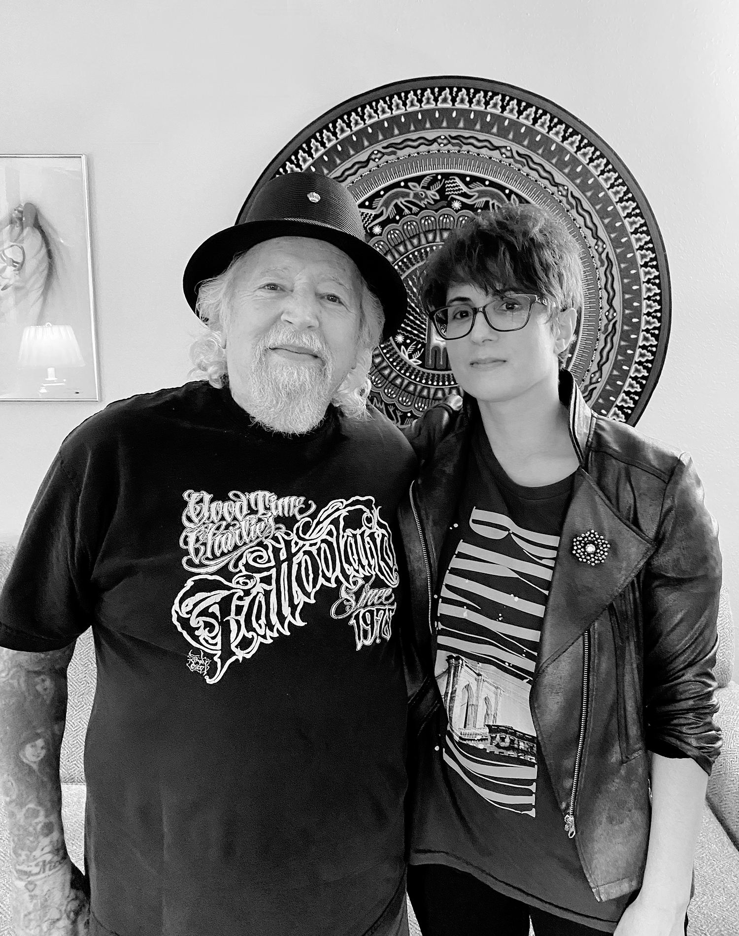 Legendary tattooer Charlie Cartwright (good time charlie) and tattoo journalist Adriana de Barros