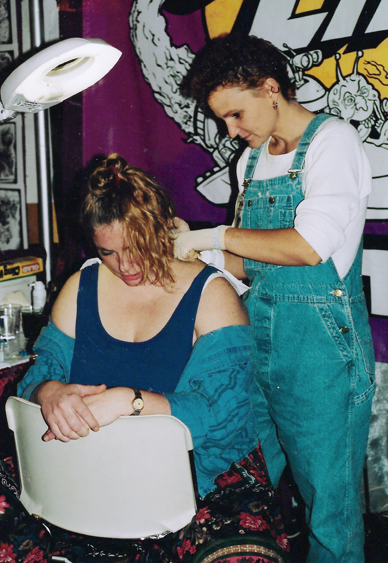 kari barba at her anaheim studio, tattooing client, in 1990s - tattoo history, legend