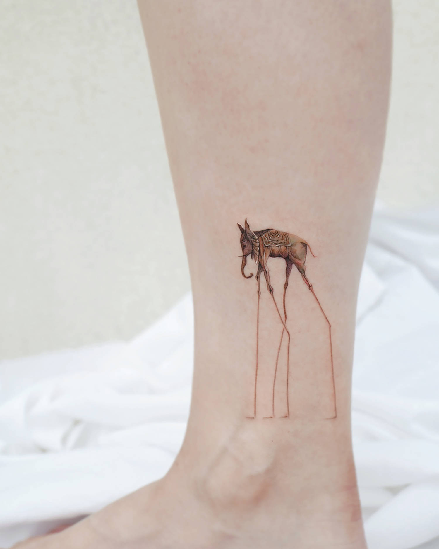 Strange Salvador Dali Elephant Tattoo Idea