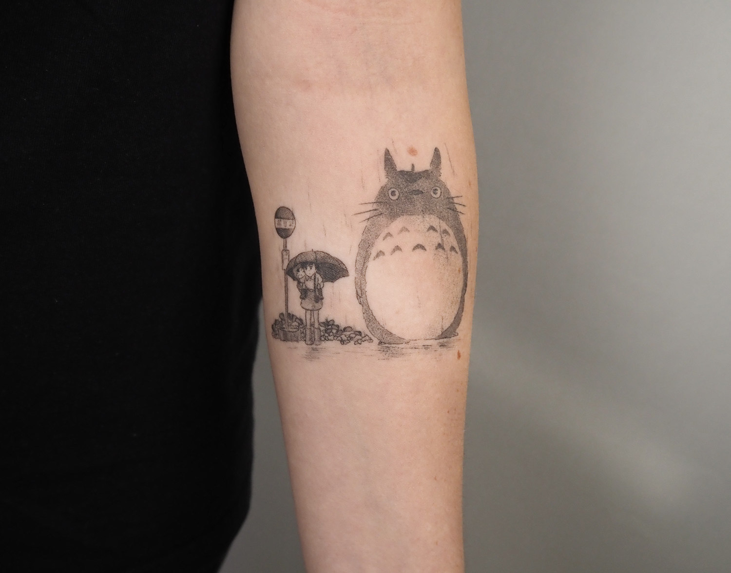 A tattoo that has healed eight months; a scene from “My Neighbor Totoro.”