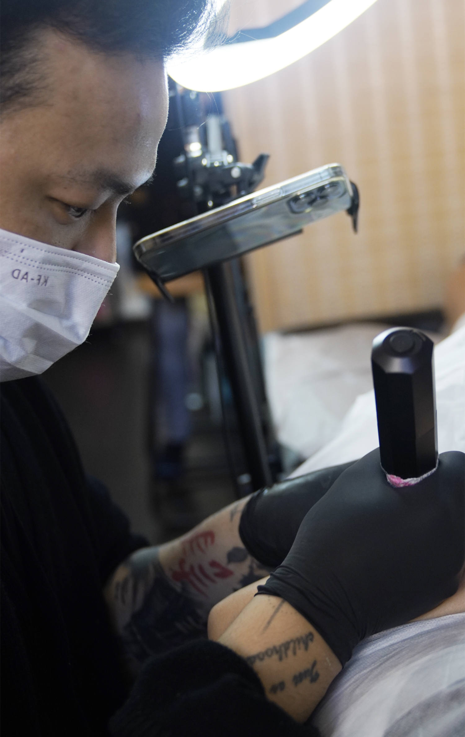 Pauline in his element at a private tattoo studio
