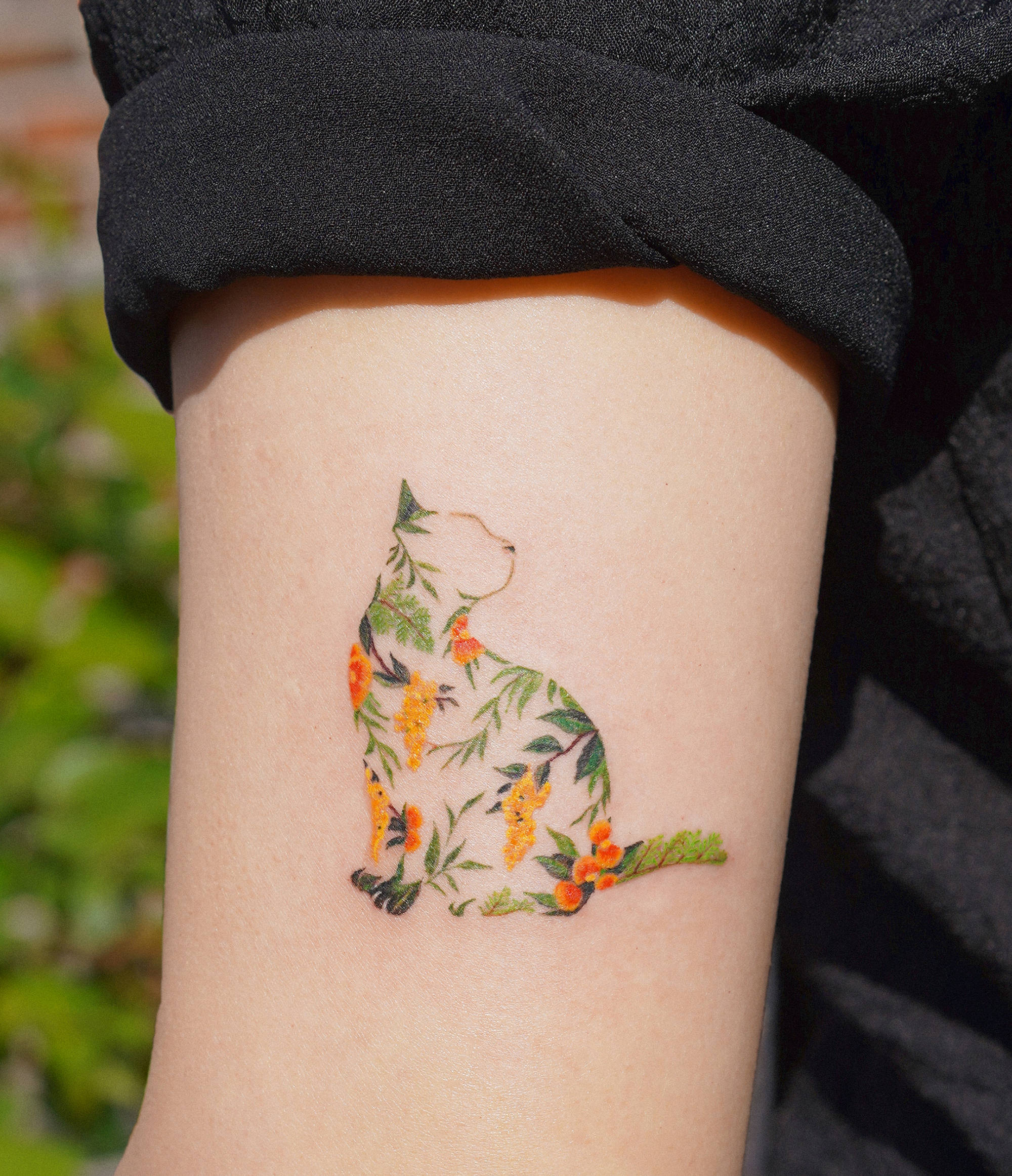 Cat made of flowers tattoo