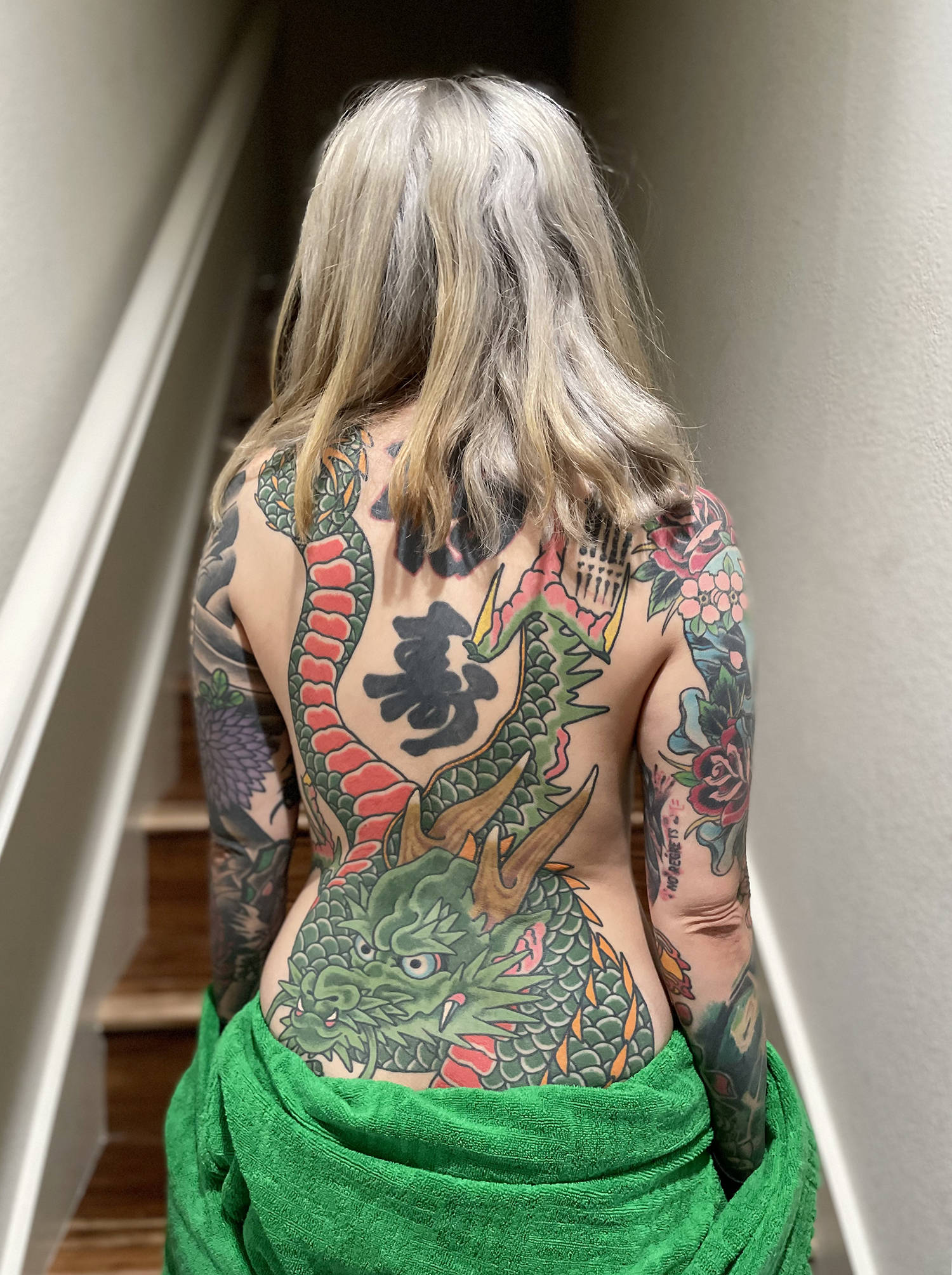 The tattoo artist s wife, Molly, has a dragon fully shaded in tebori