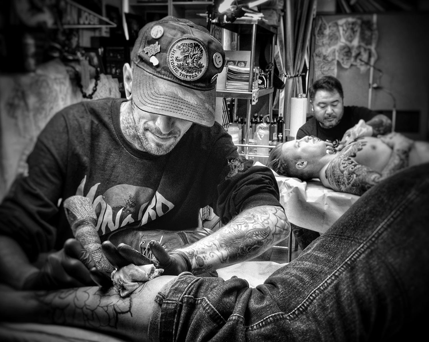Tattooist Tyler Harrington working alongside Kitamura at State of Grace studio