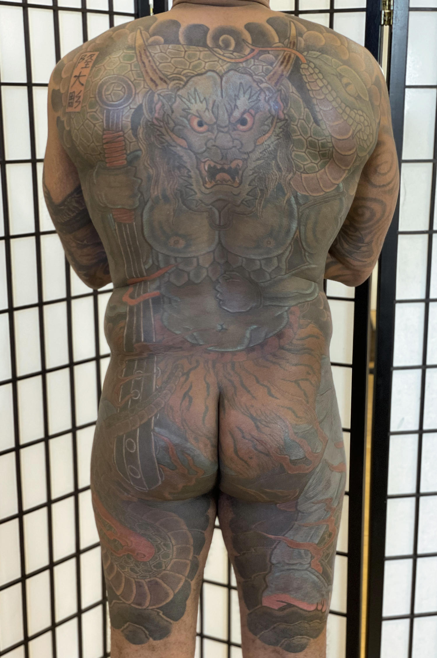 The demon Rasetsu is tattooed on back  Tattoo on Darker skin