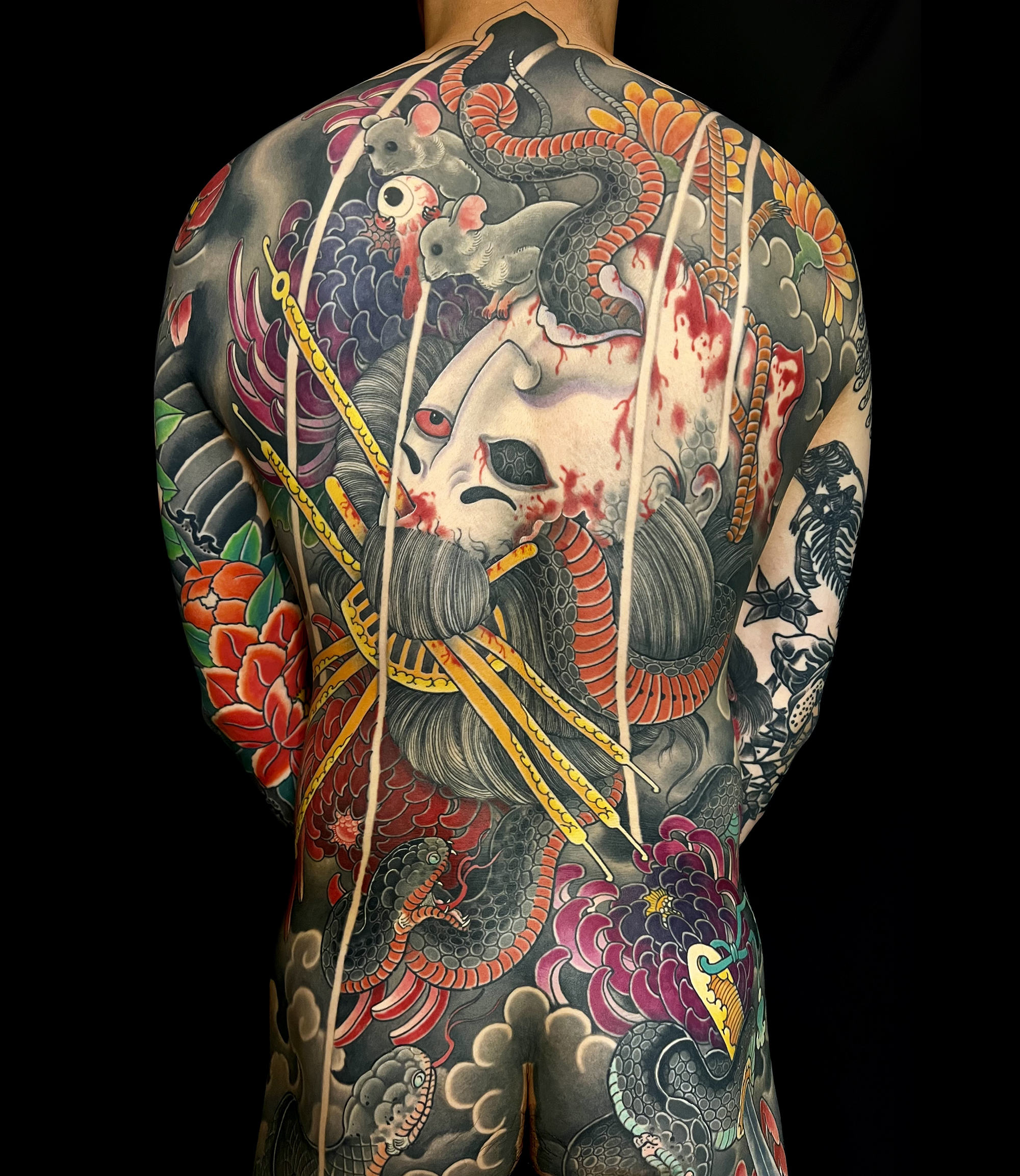 Jehoo created this elaborate back tattoo three years ago. 