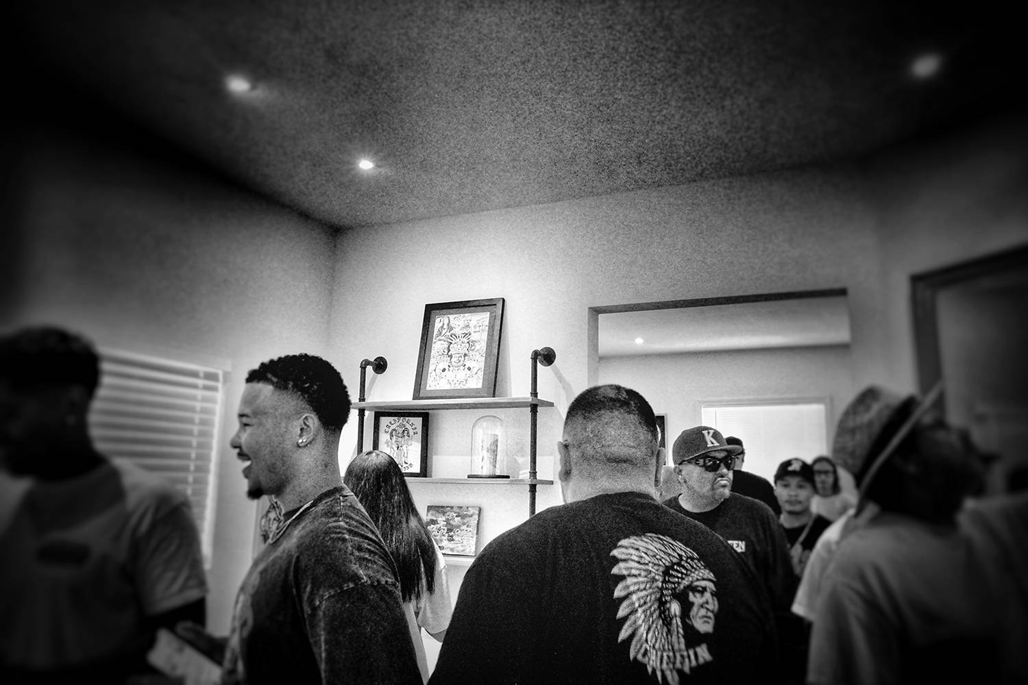 Spectators at the art show at secret sidewalk tattoos