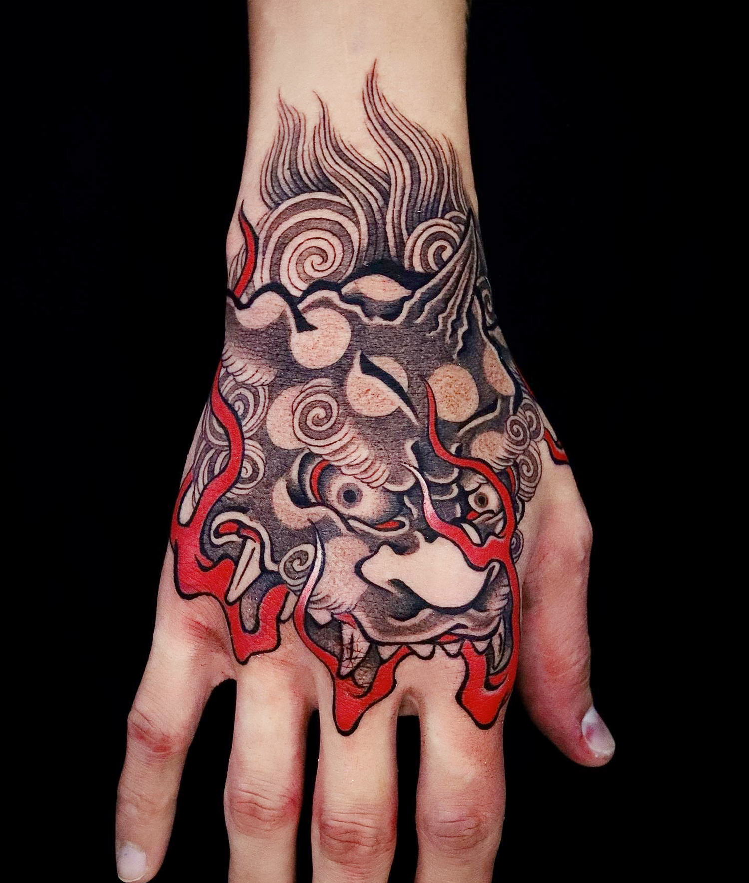 fu dog tattoo on hand by dino