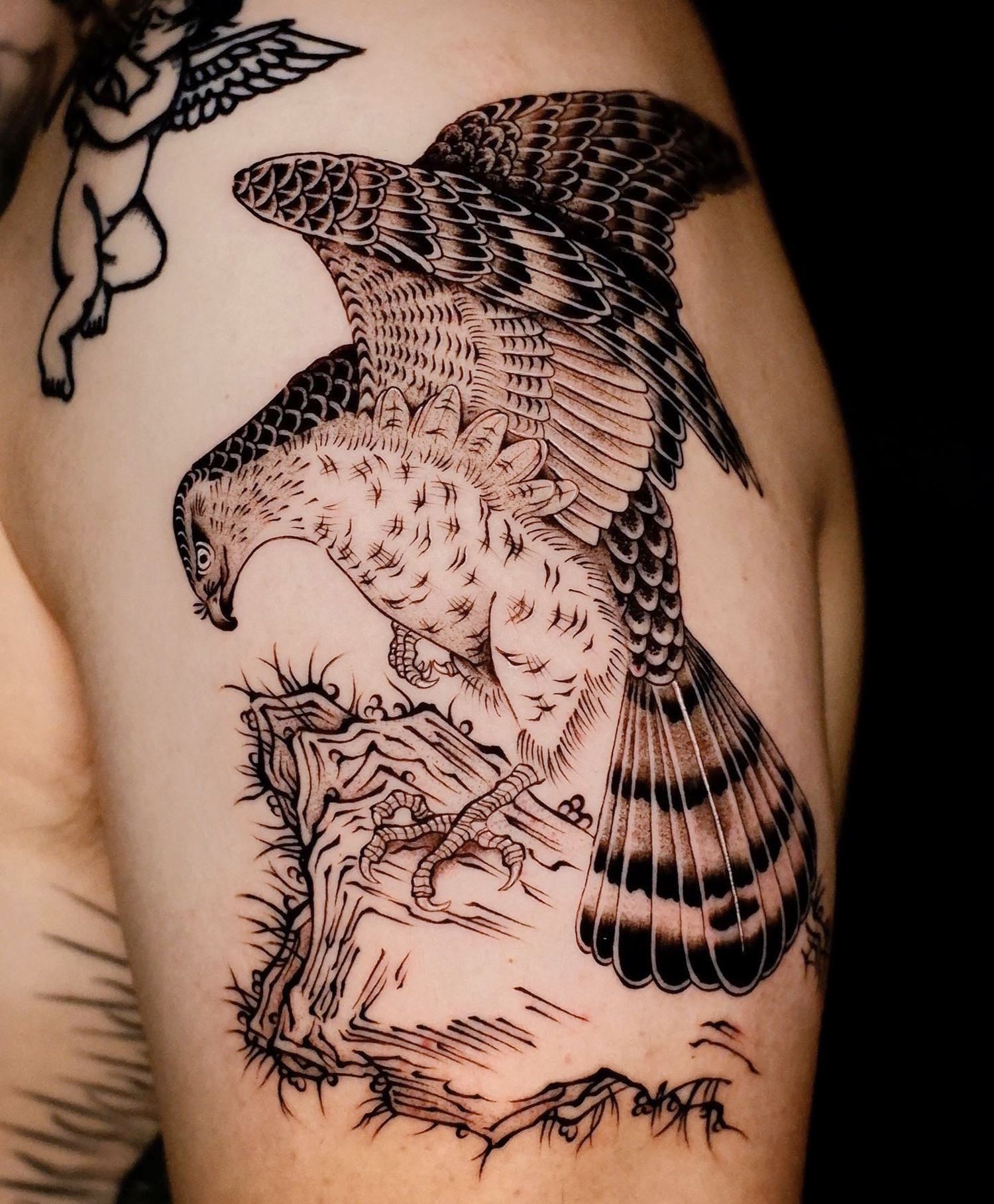 engraving like eagle tattoo on arm