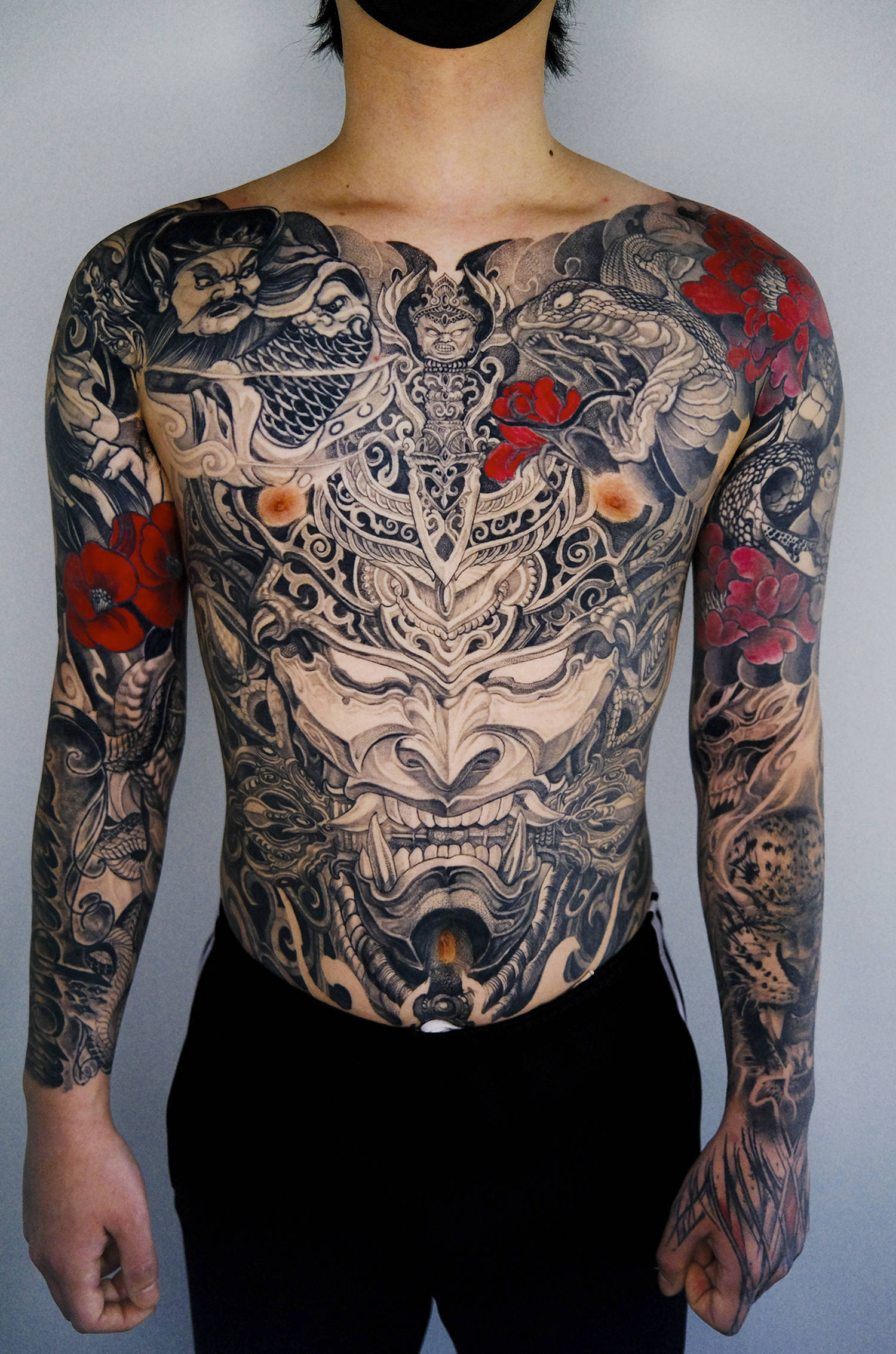 The torso and sleeves of one of Girin's best tattoos