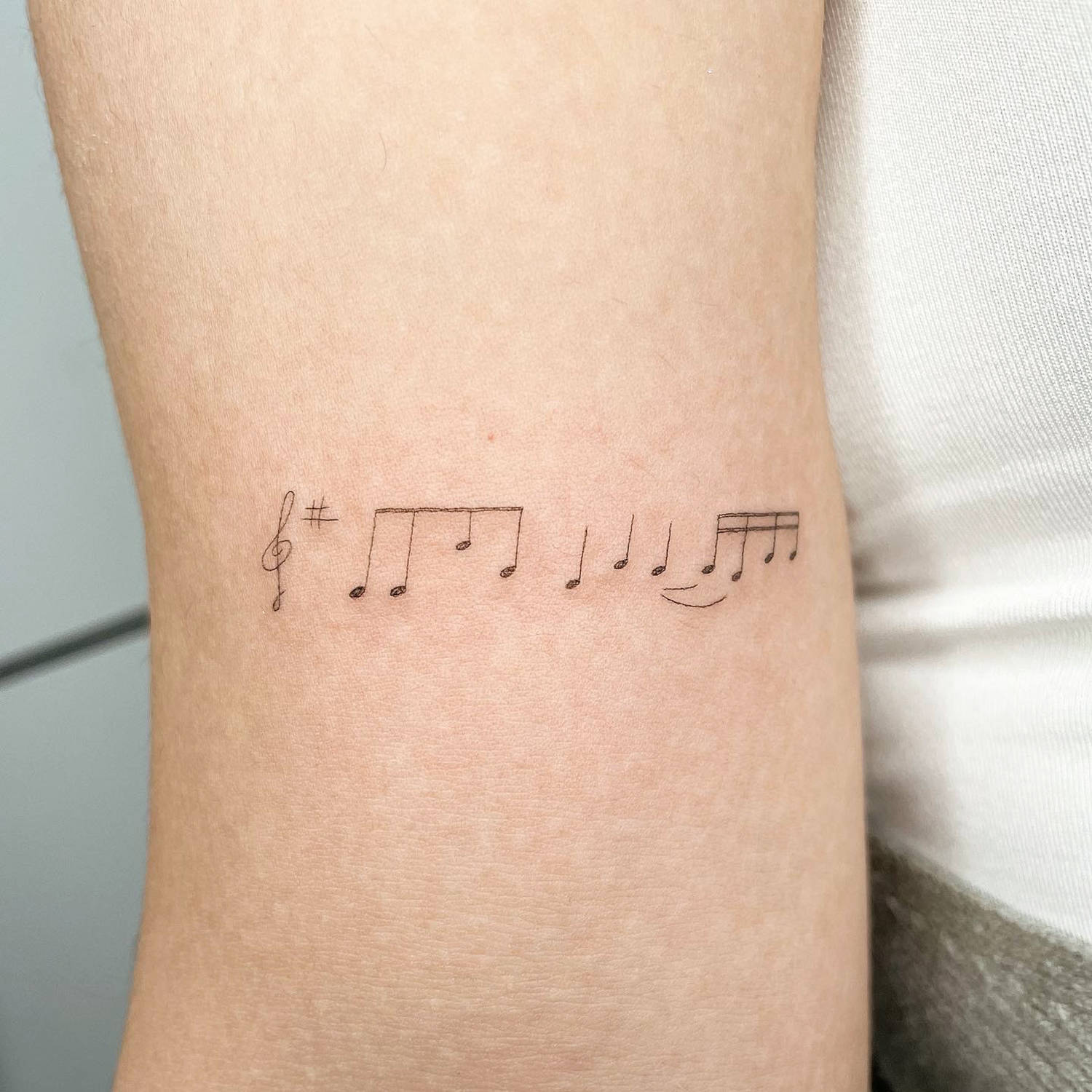 Musical notes in black ink