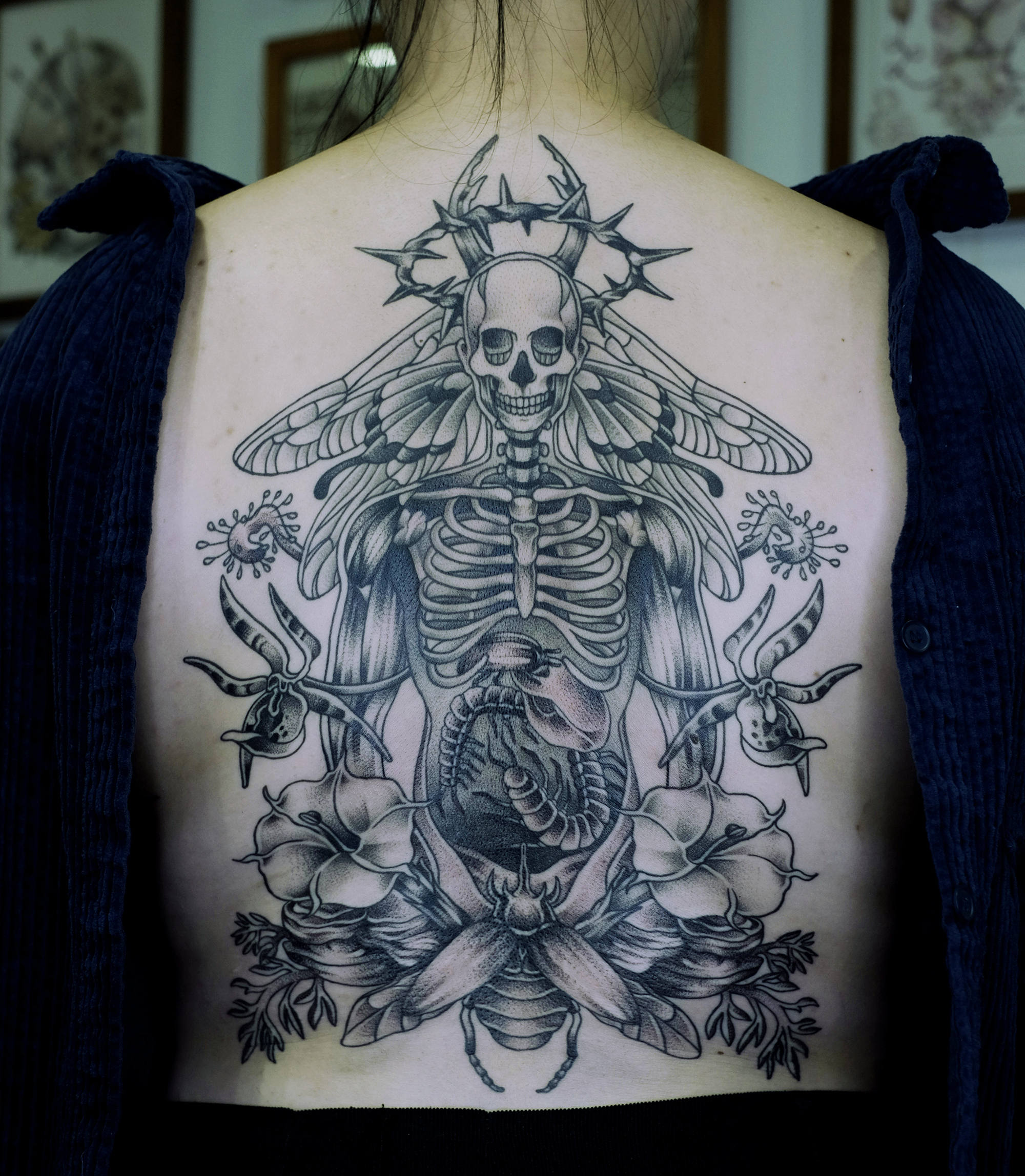 Dark art tattoo with skeleton on back by yelselogy from singapore