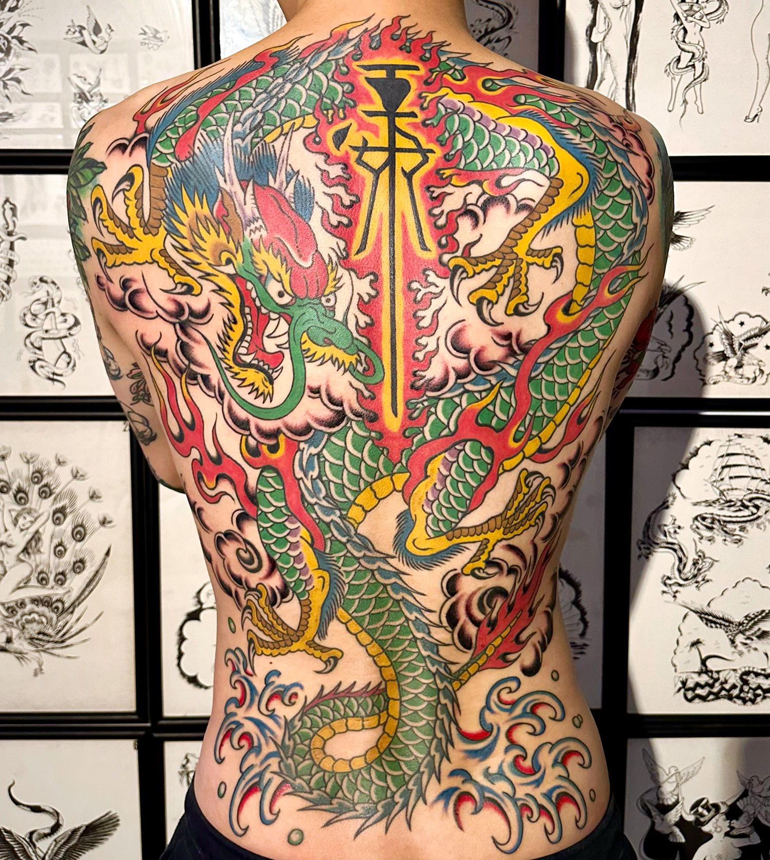 ornate, east asian tattoo on back, bright and color by jimmy shy