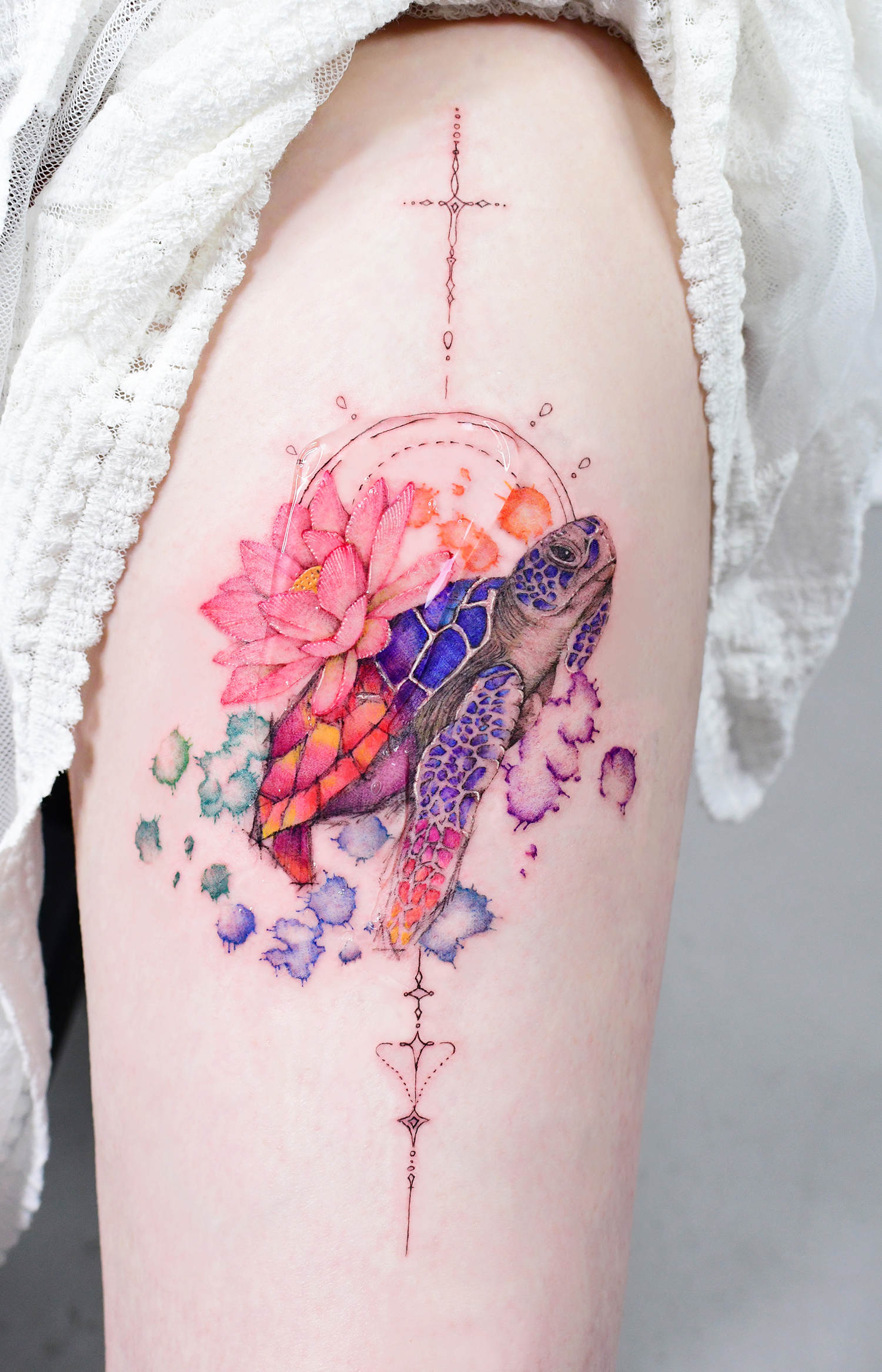 colorful turtle with flower, painting style tattoo
