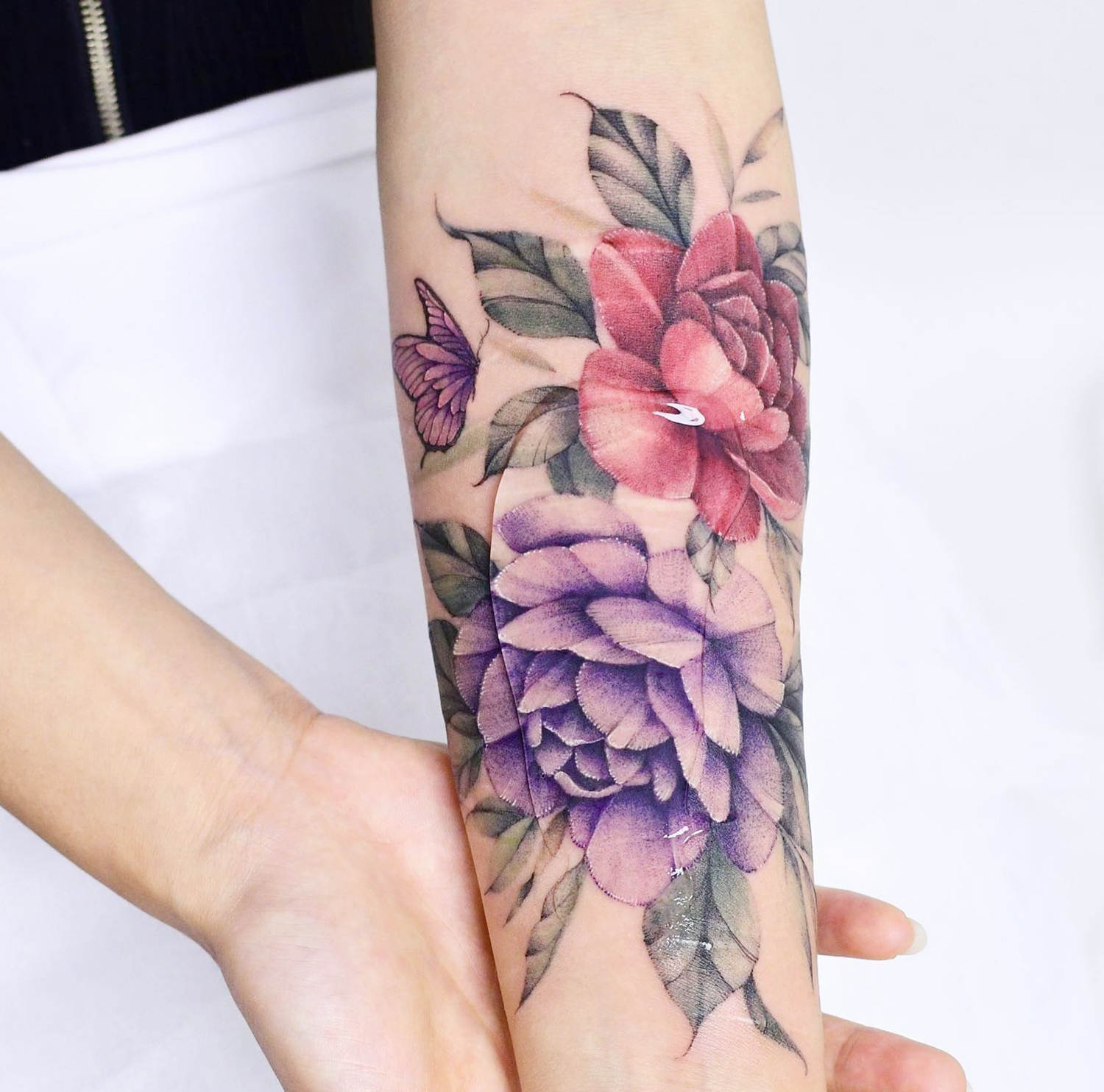 Tattoo cover up over suicidal scars on arm, healing tattoo