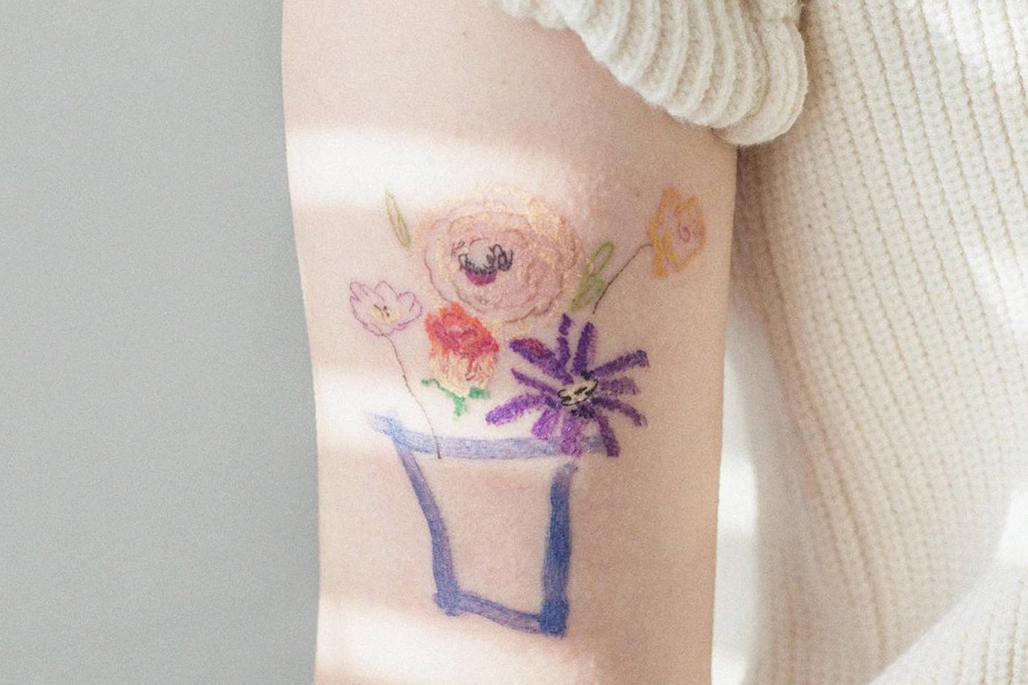 oil pastel like flower tattoo