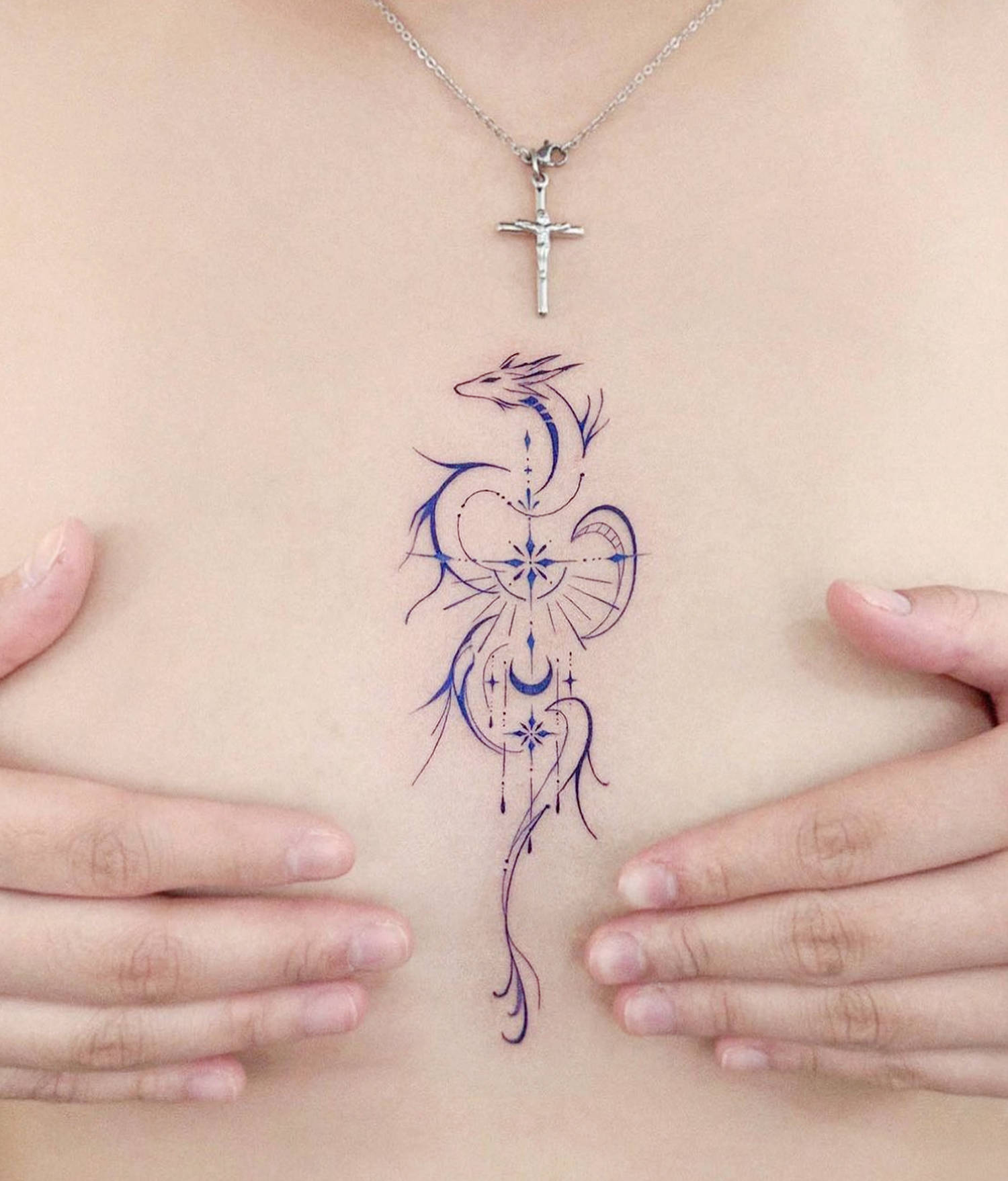 dragon ornament pendant tattoo on chest