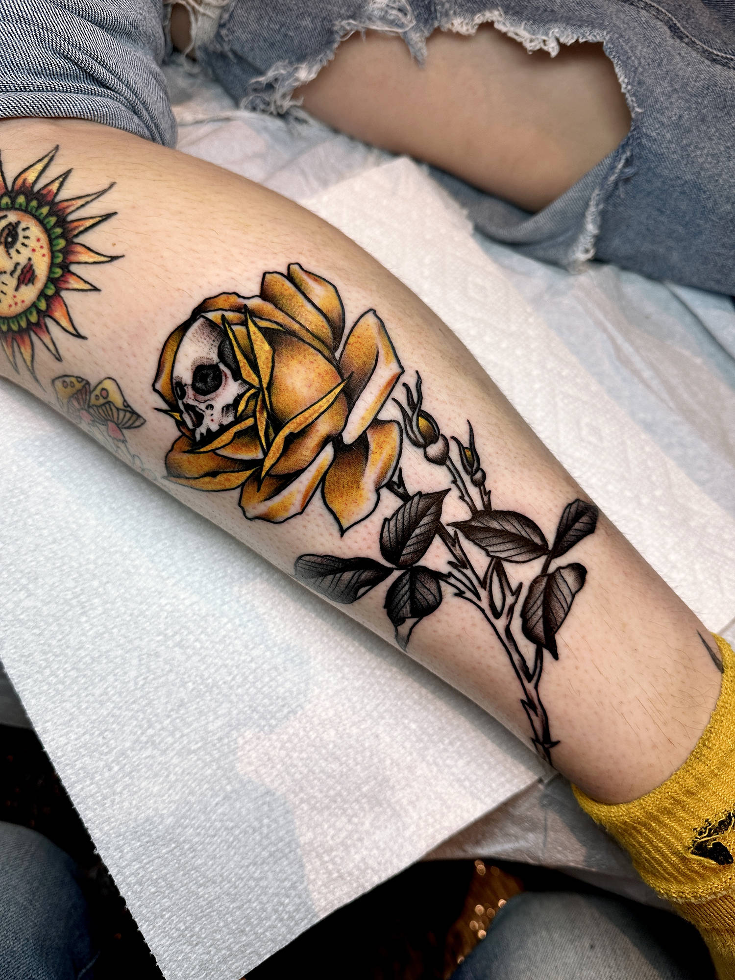 A skull rose can symbolize the balance of life, and yes, Mark Clifford does color tattoos