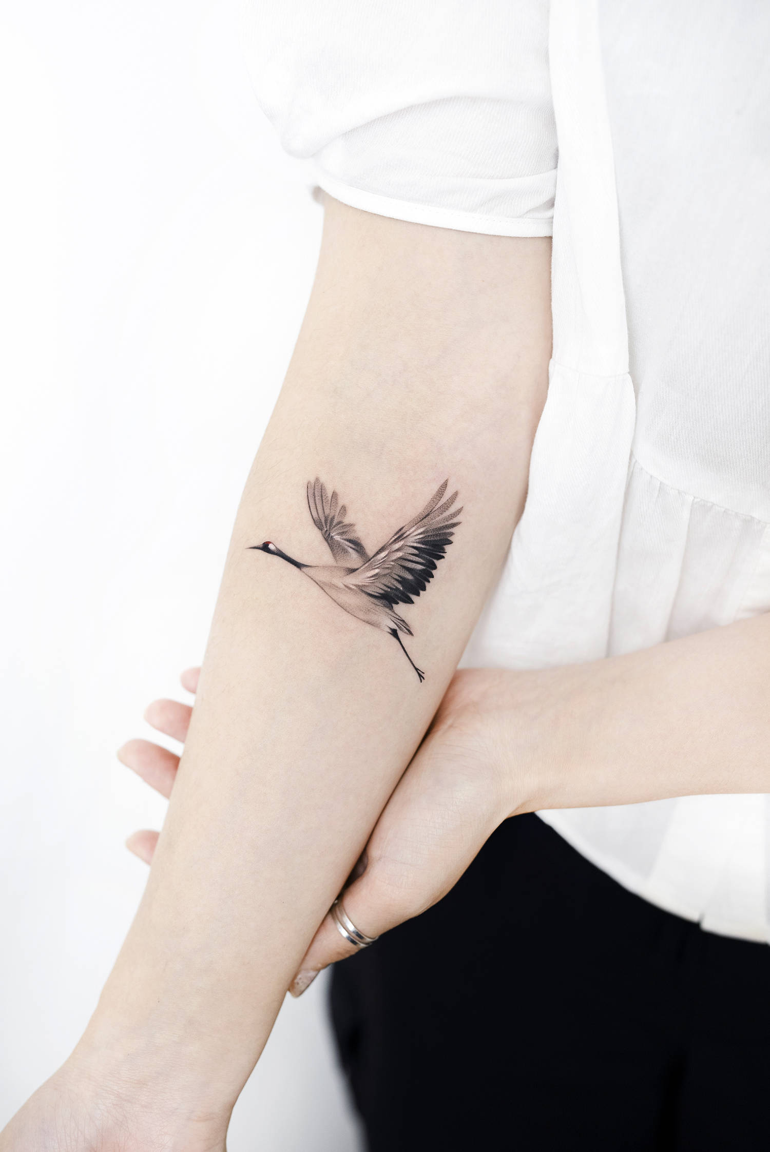 flying bird tattoo